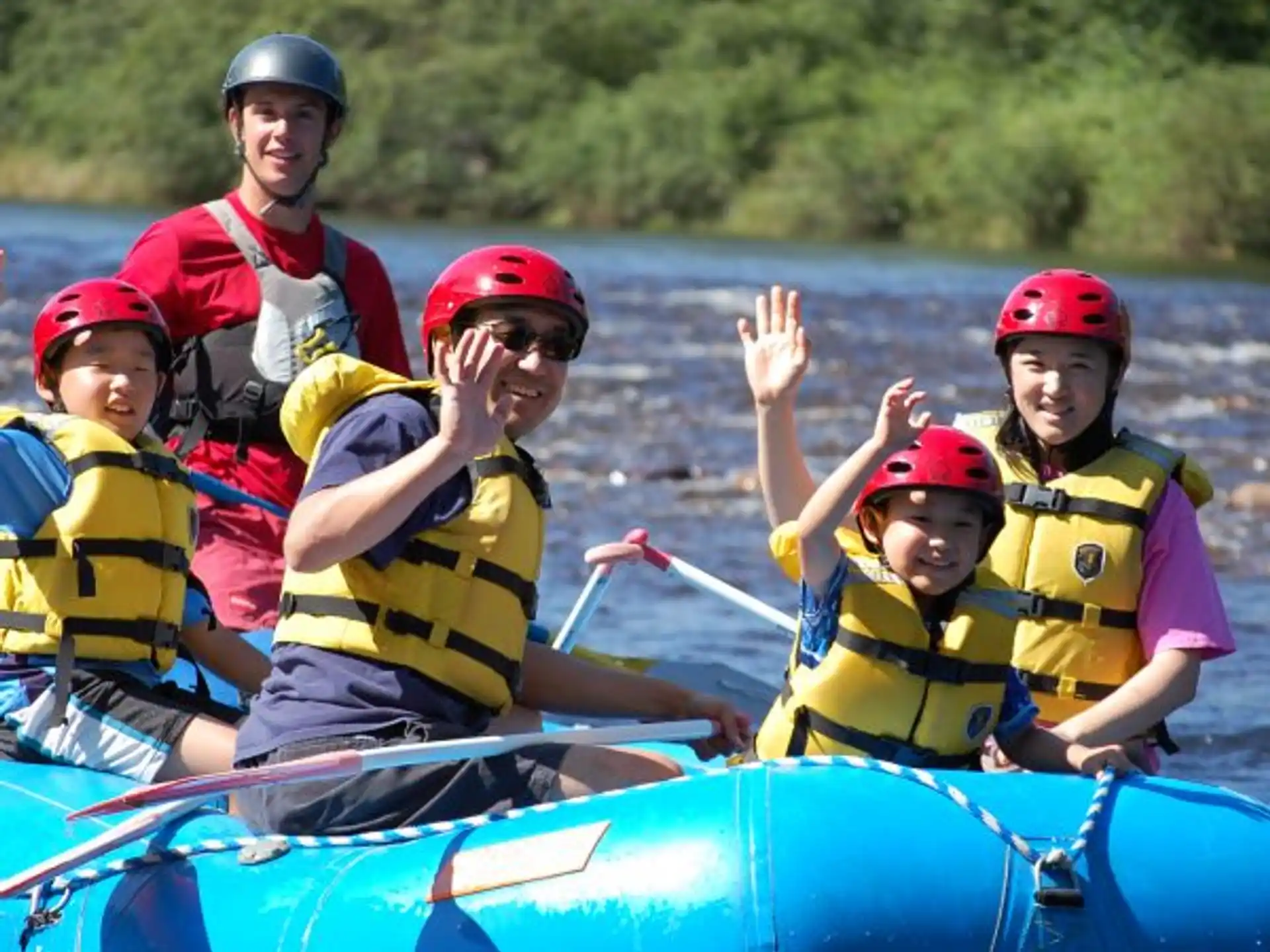 a group of people in a raft