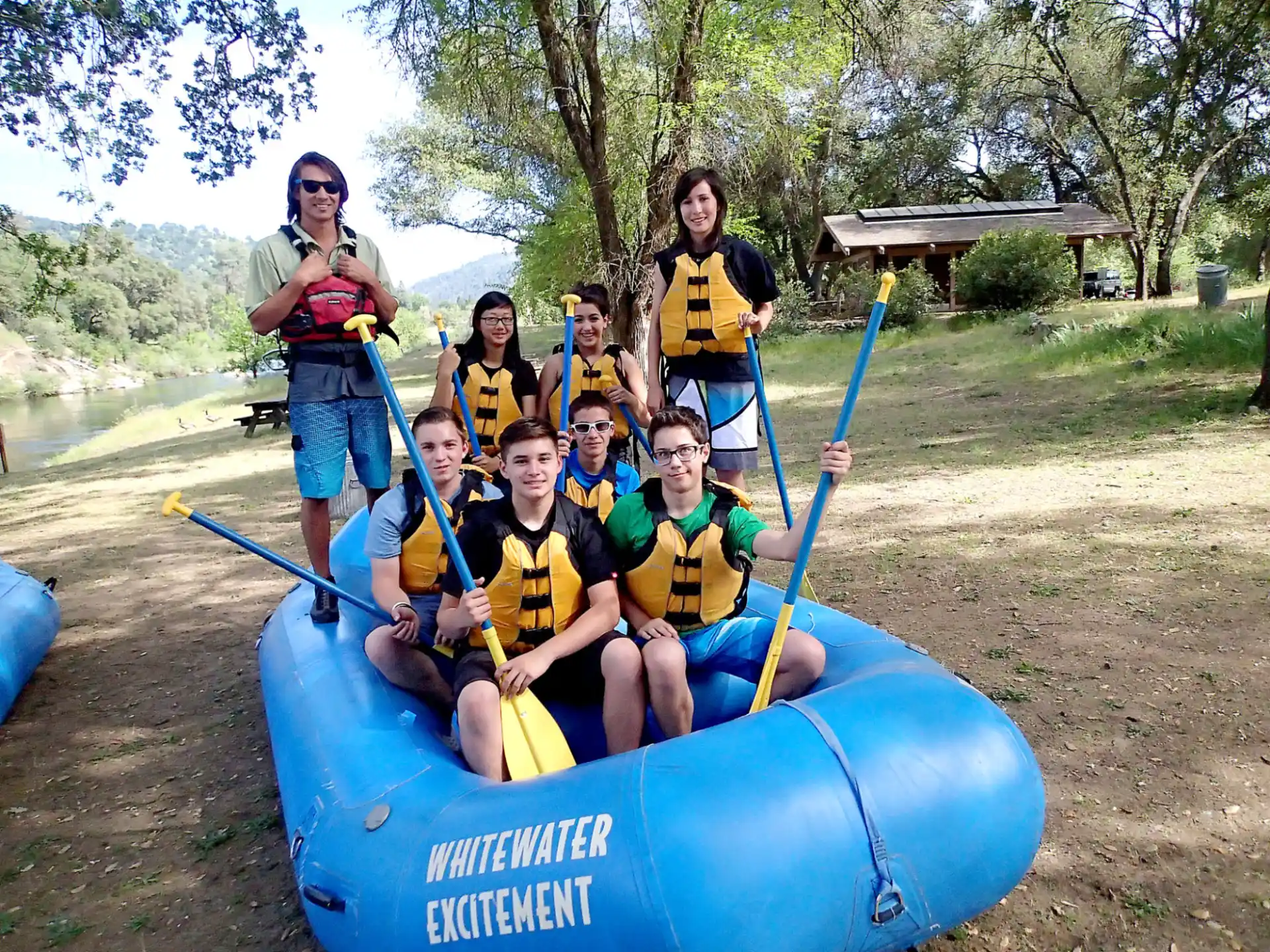 a group of people in a raft