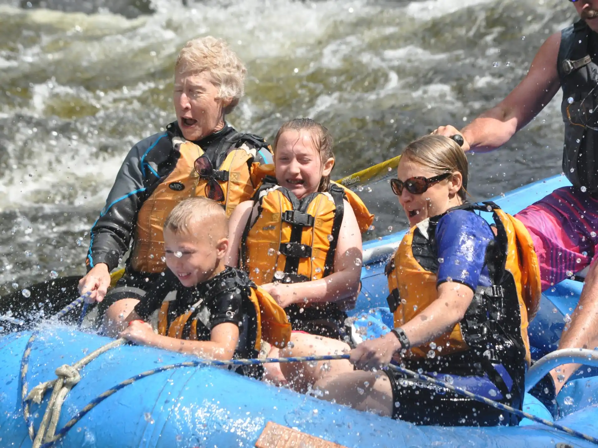 a group of people in a raft