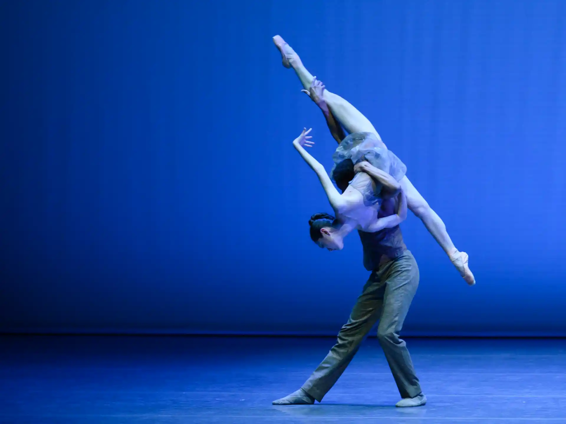 a man and woman dancing