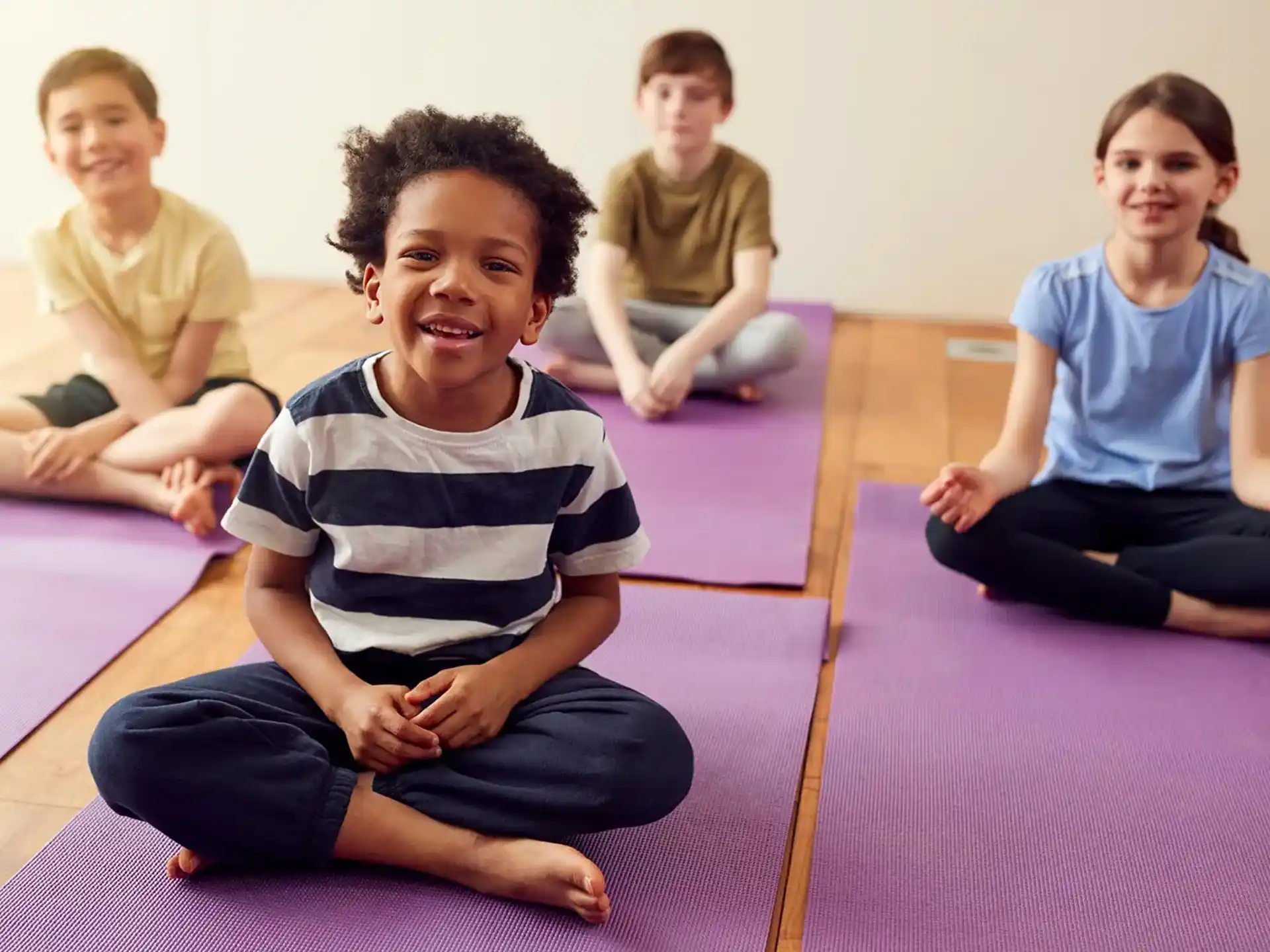 a group of children sitting on the floor