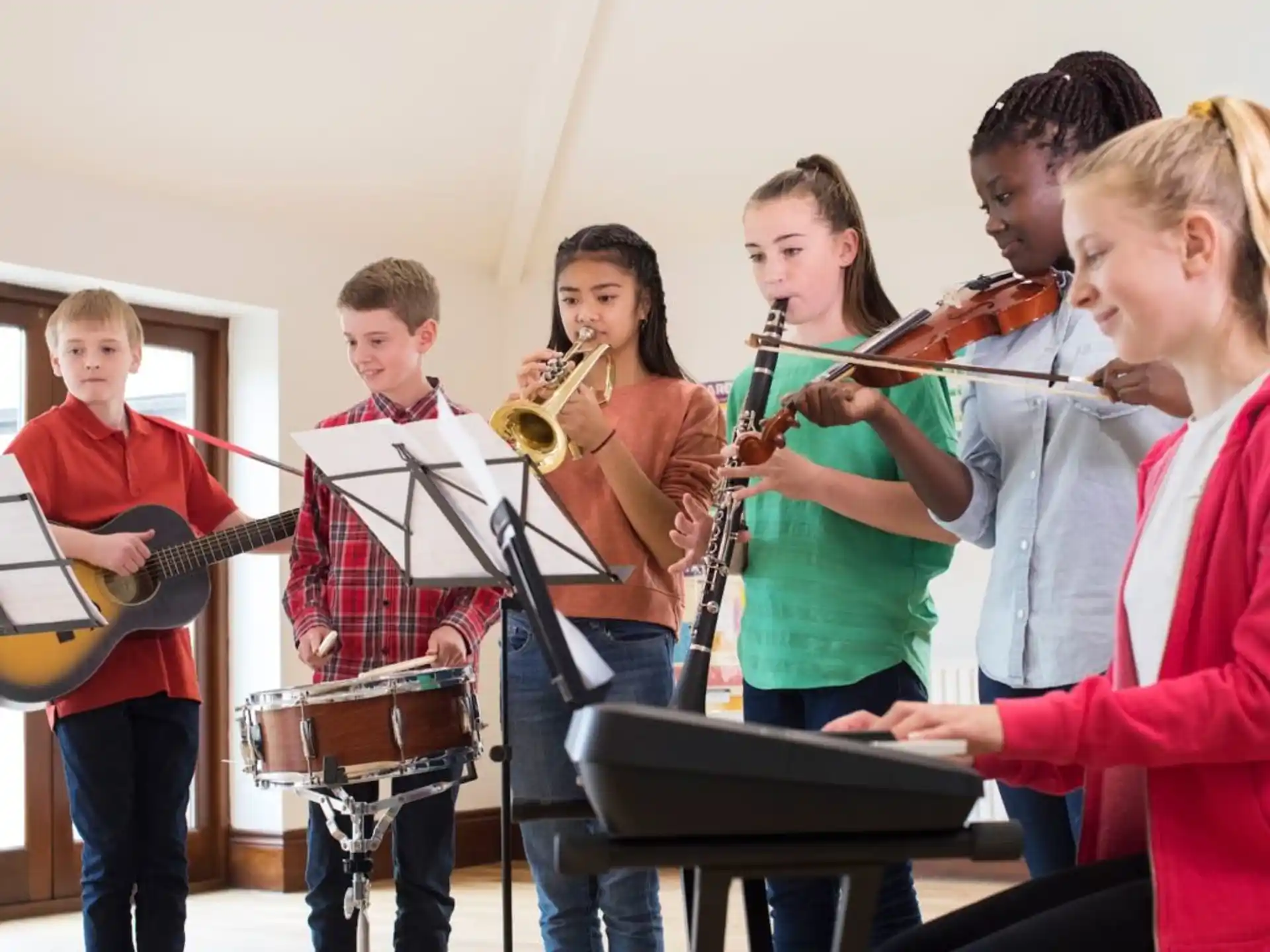 a group of people playing instruments