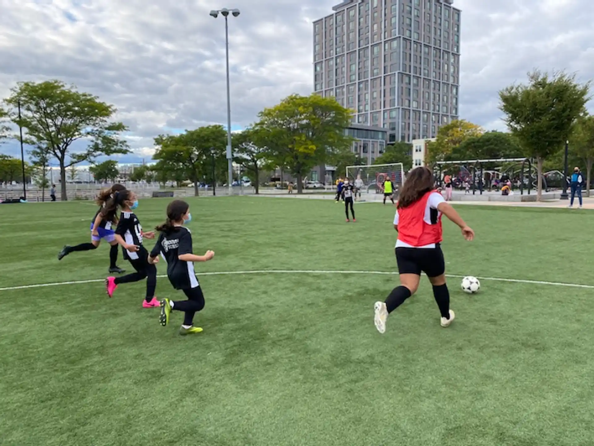 a group of girls playing football