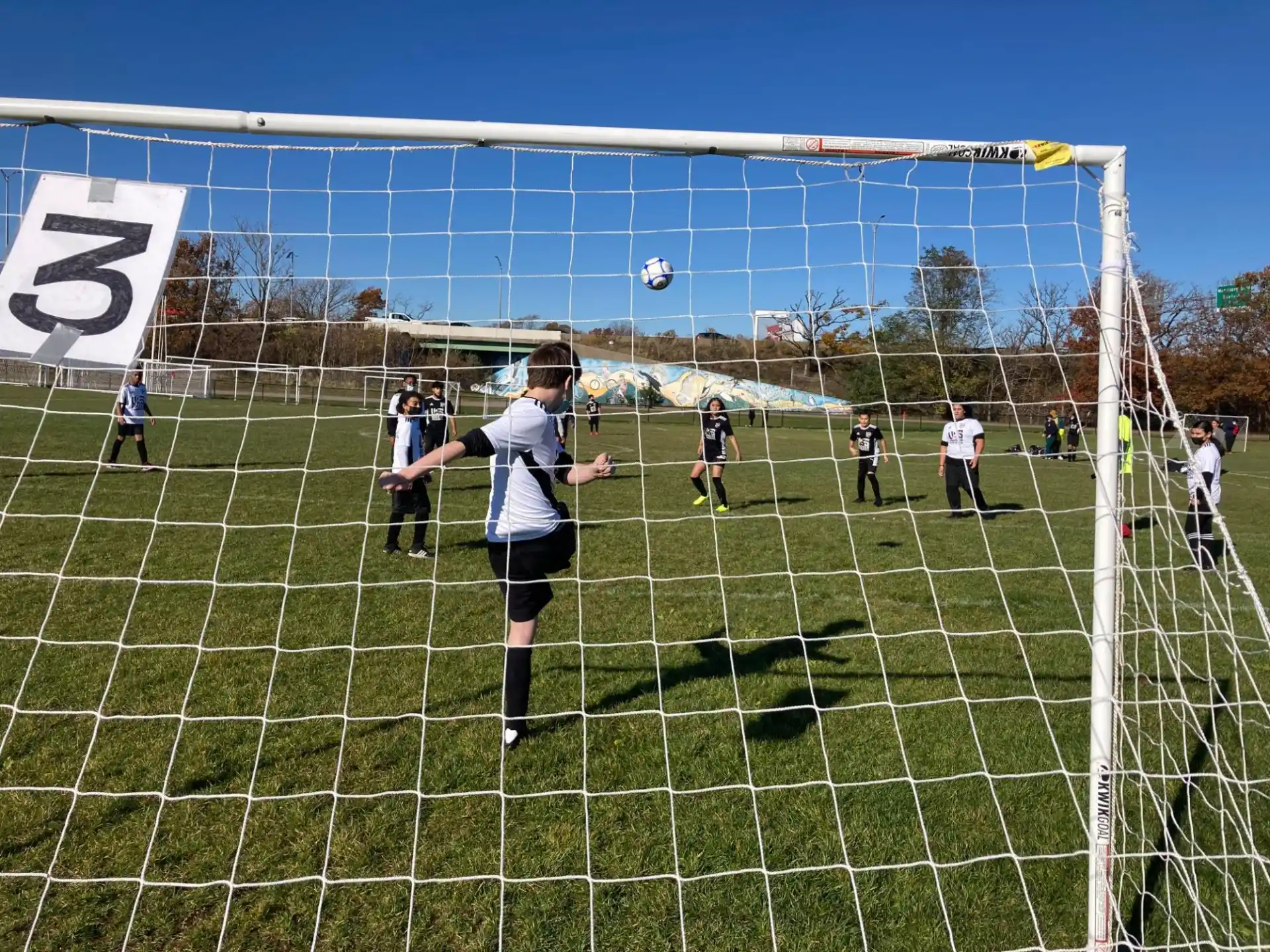 a group of people playing football