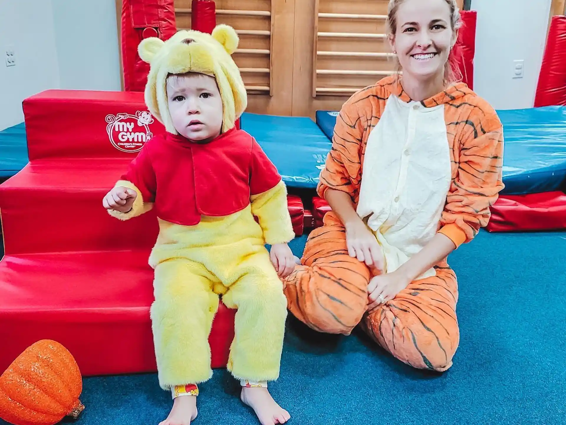 a person and a baby in clothing