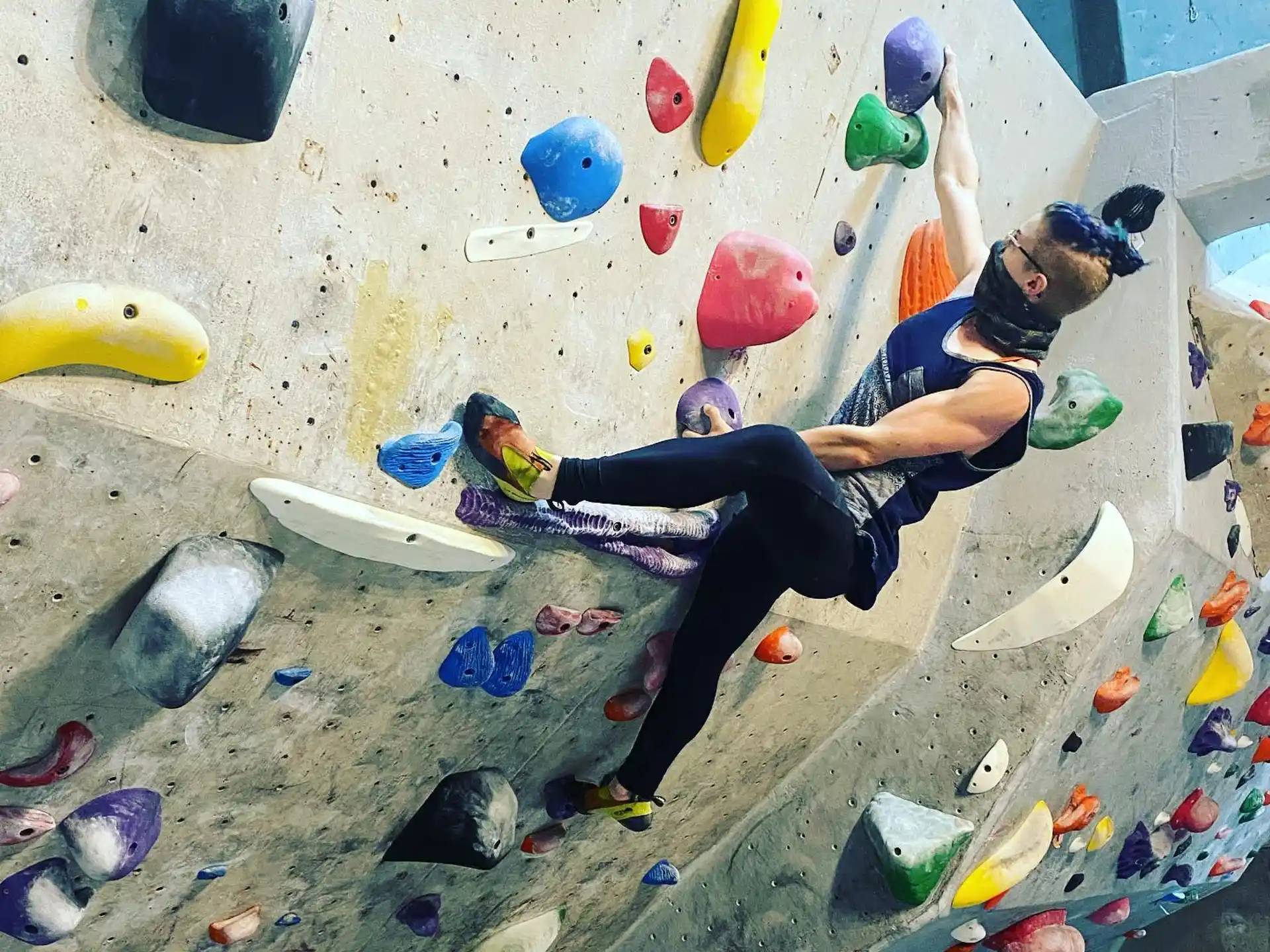 a person climbing a rock wall