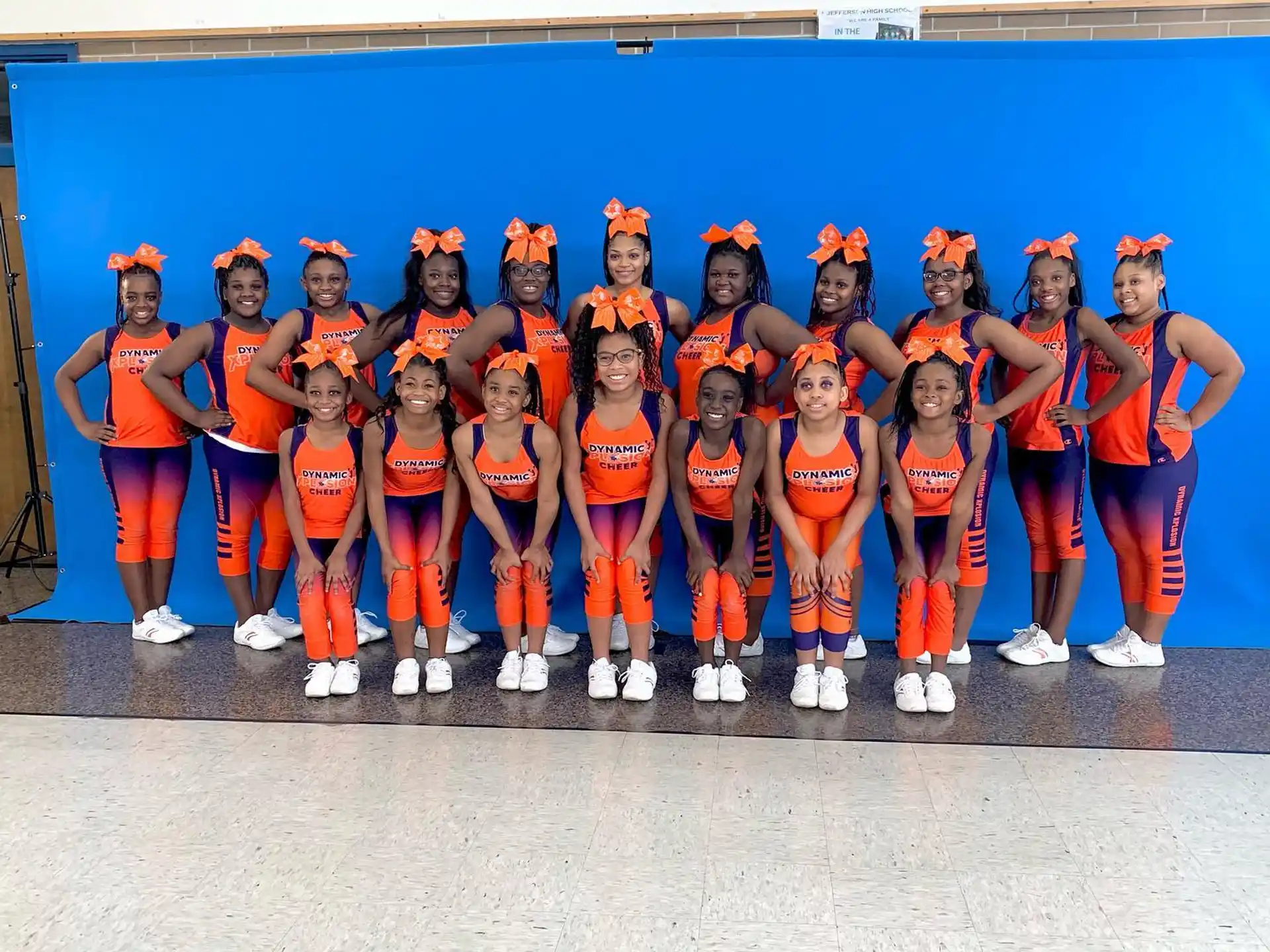 a group of women in matching outfits