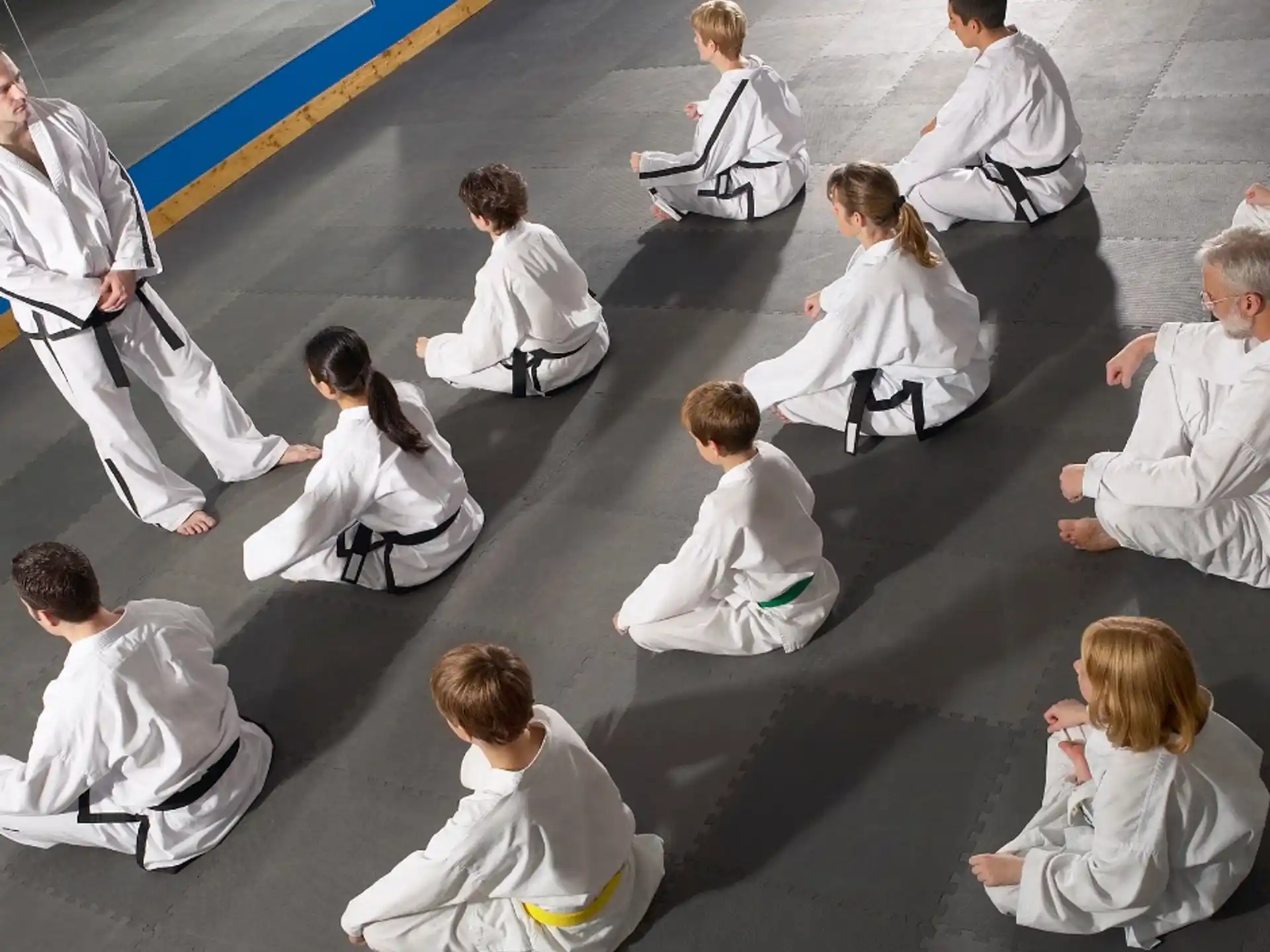 a group of people sitting on the ground
