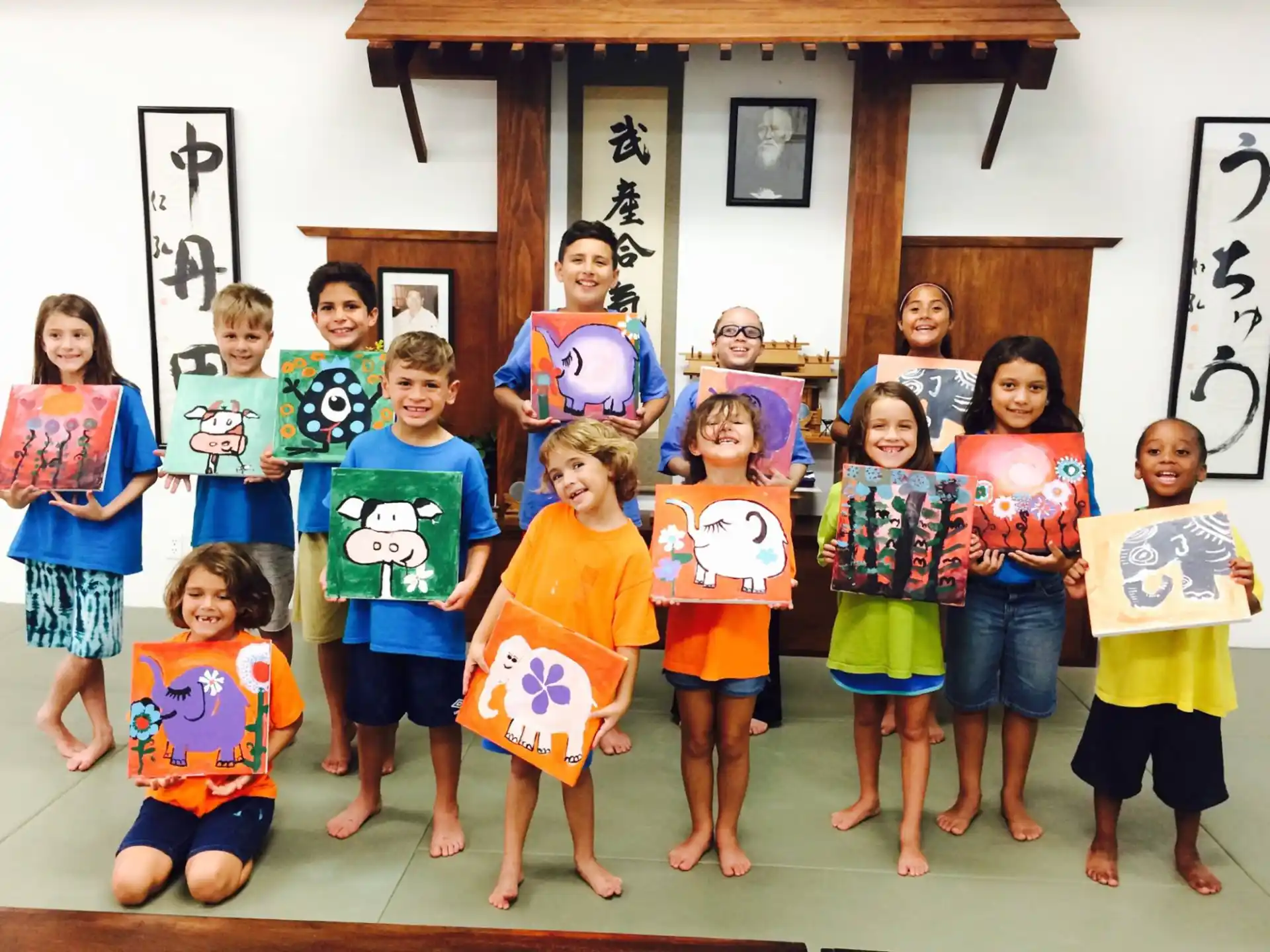 a group of children holding books