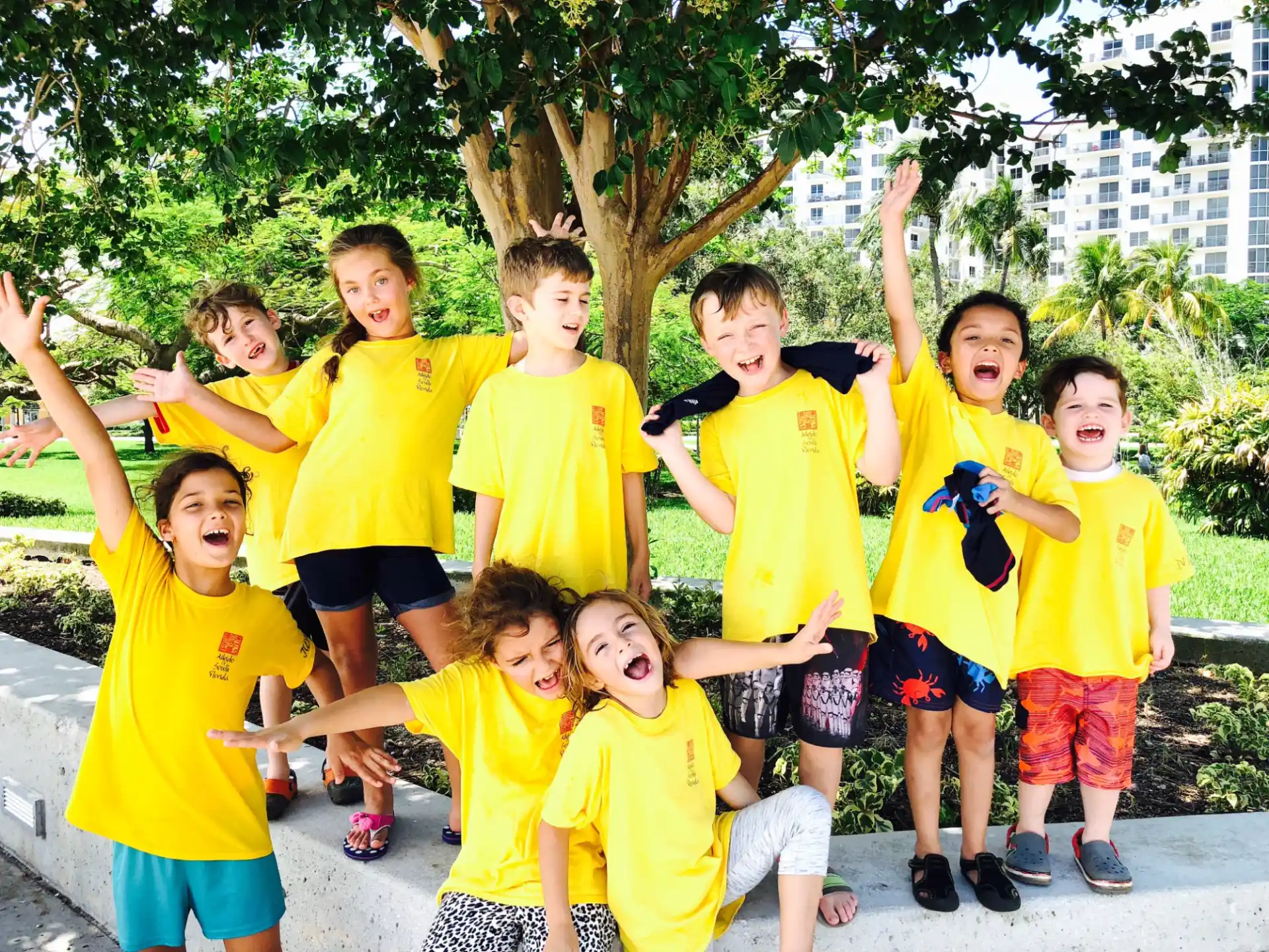 a group of kids posing for a photo