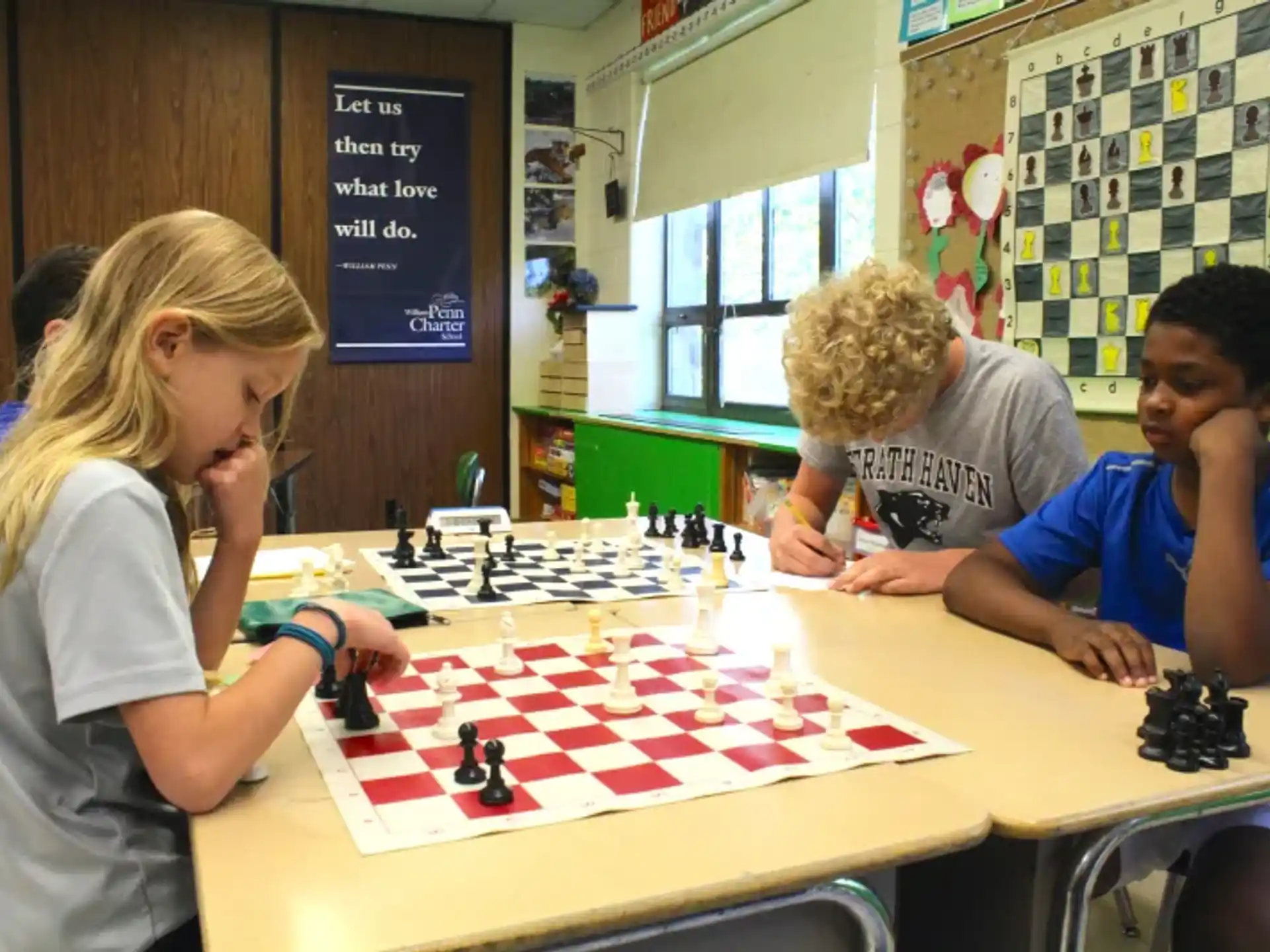 a group of people playing chess
