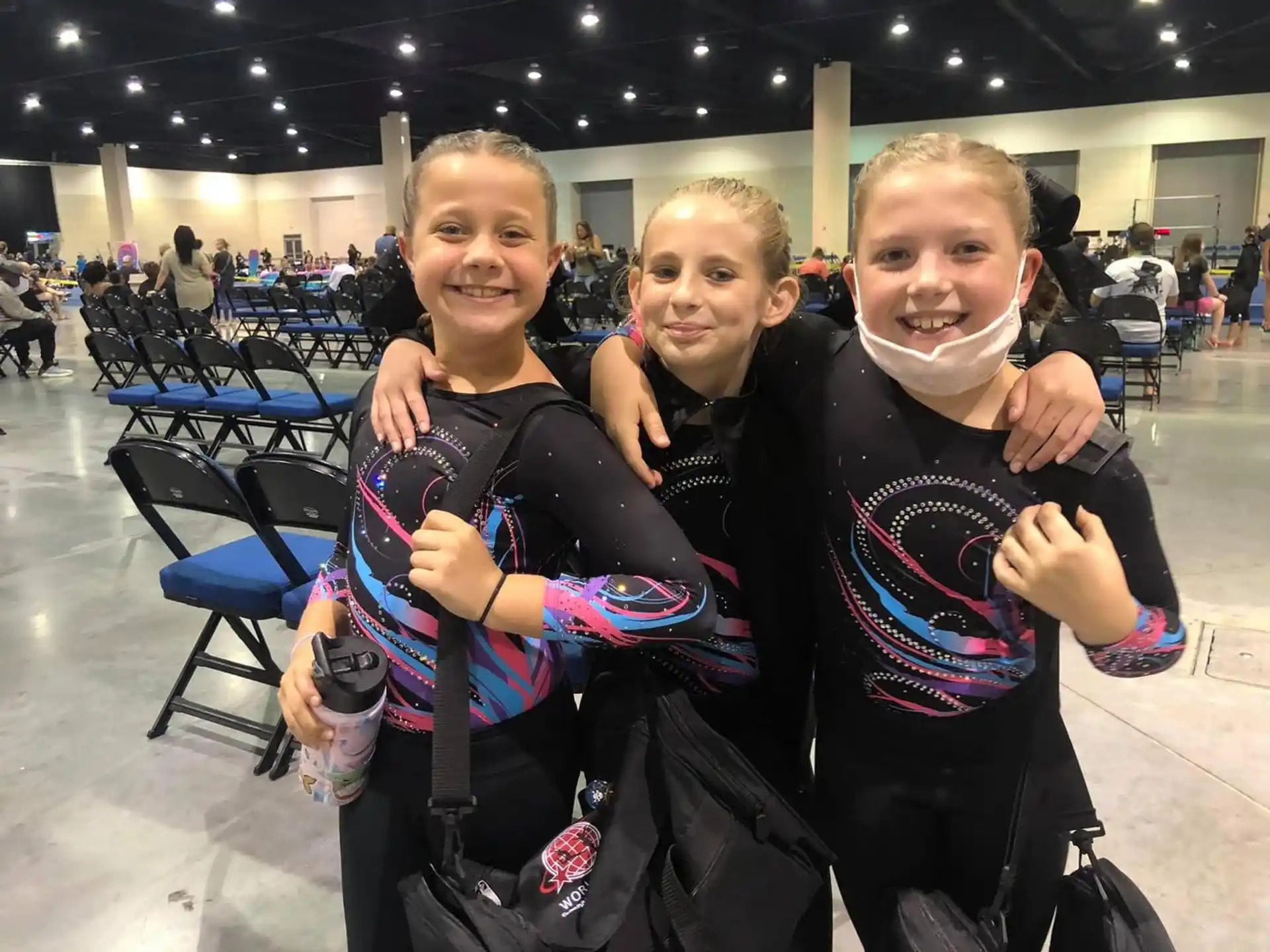 a group of girls posing for a picture