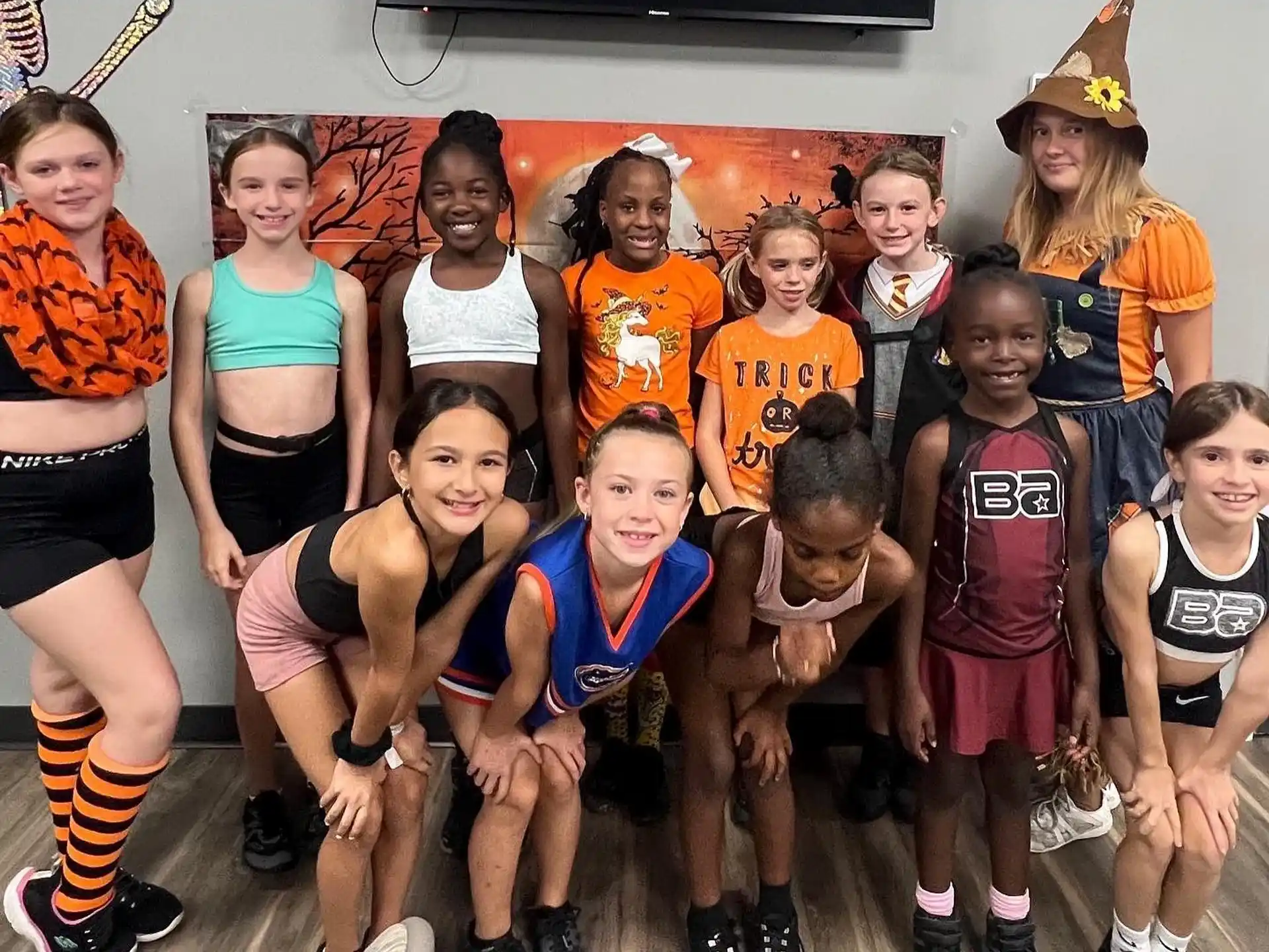 a group of children wearing clothing