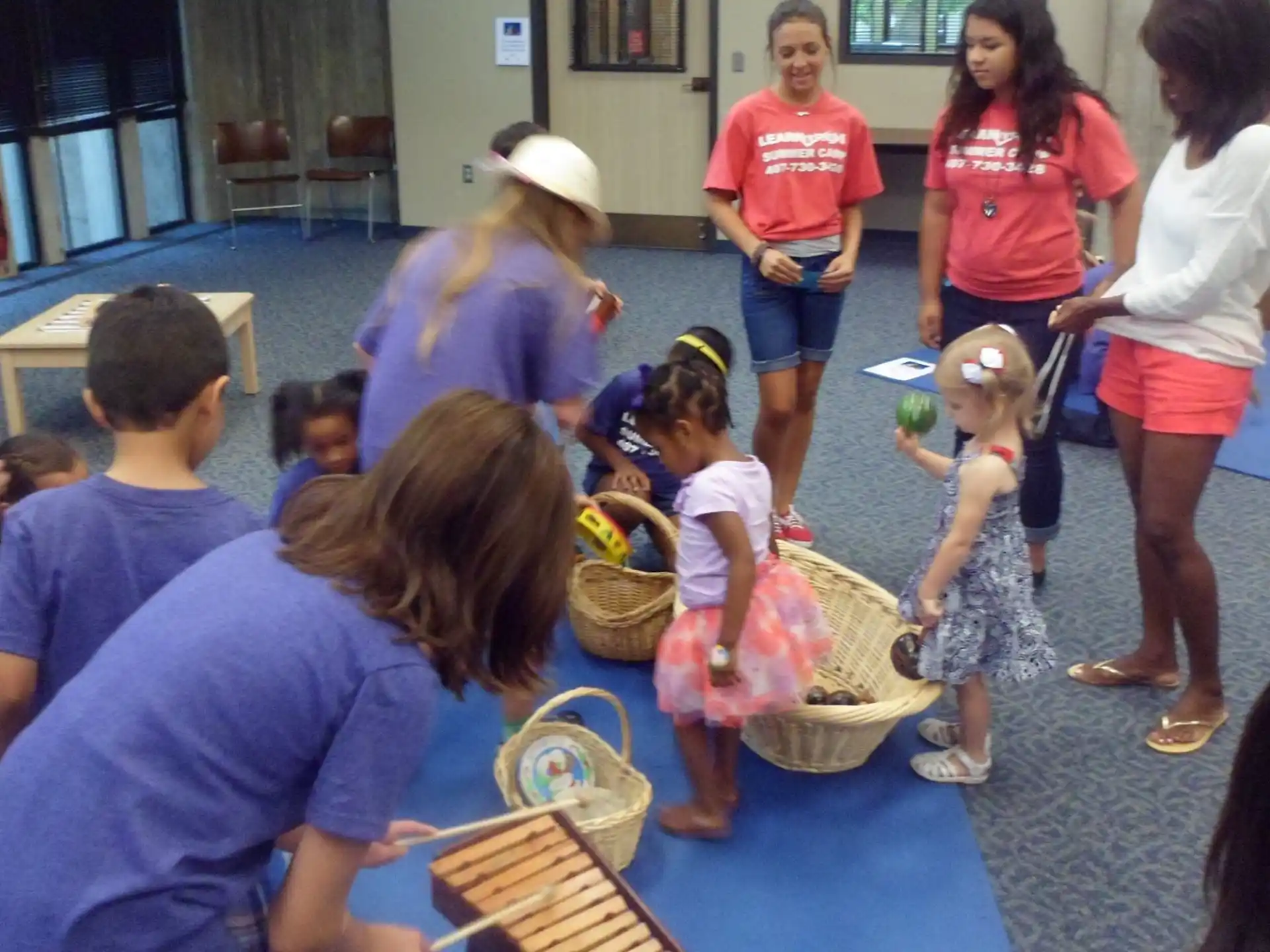 a group of people playing with toys