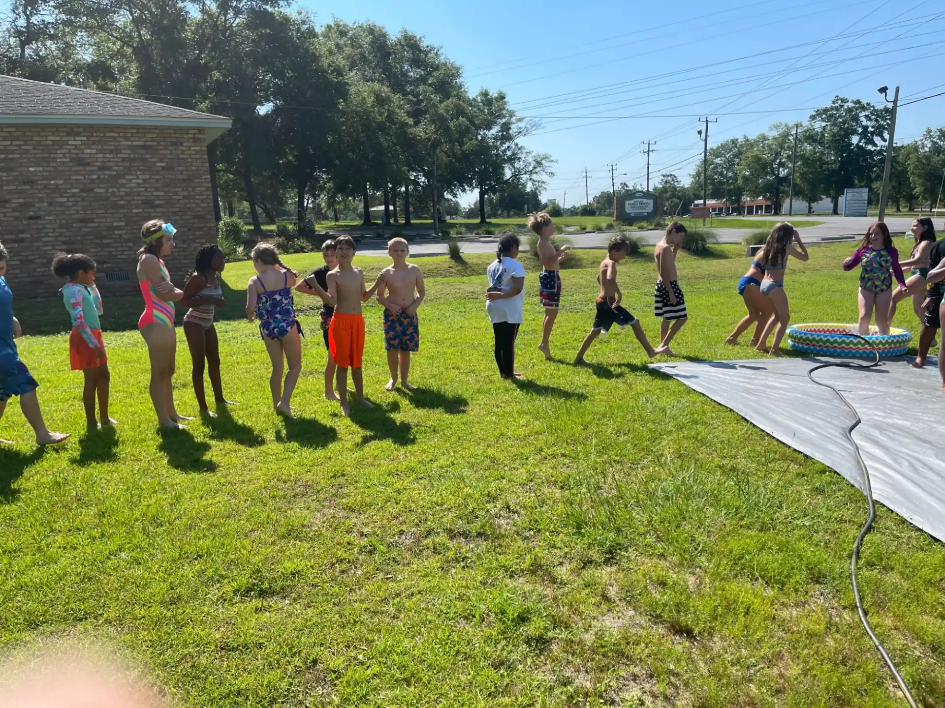 a group of people playing in a field