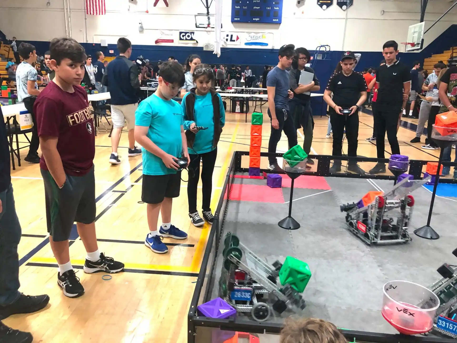 a group of people in a gym