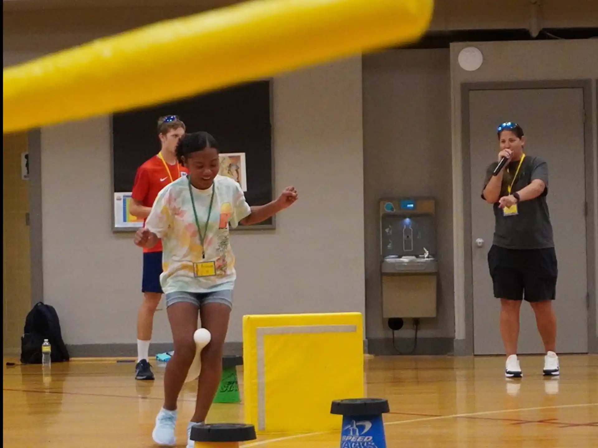 a group of people in a gym