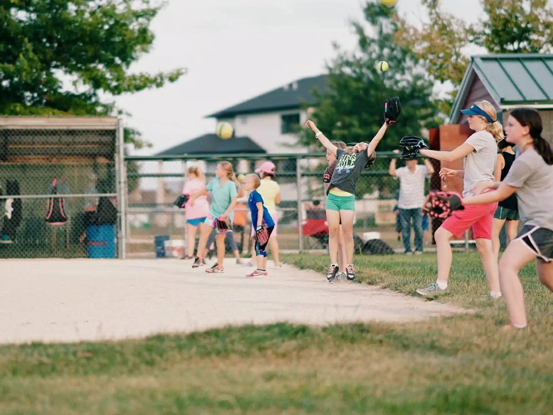 a group of girls playing volleyball