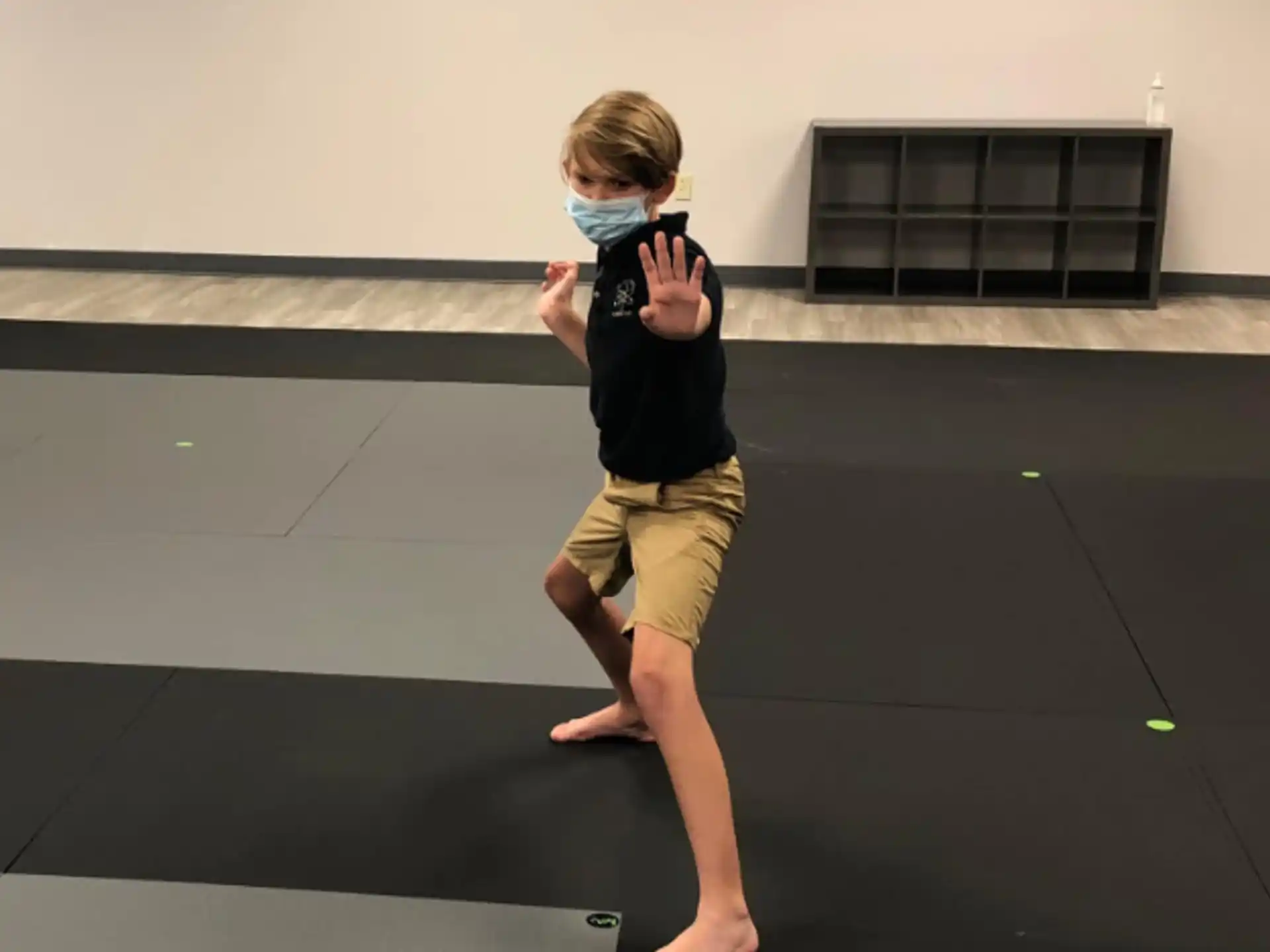 a boy wearing a mask