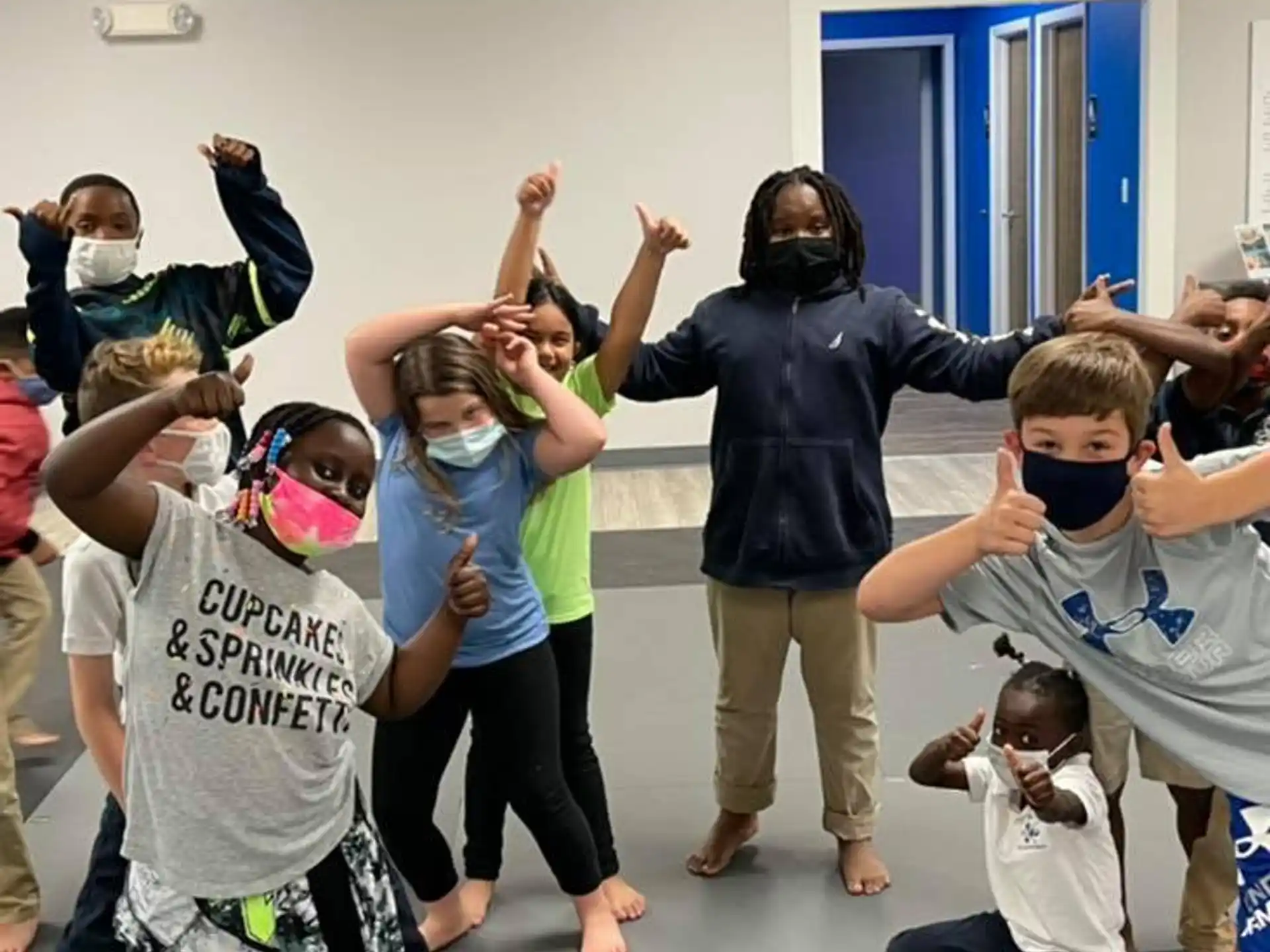 a group of children dancing