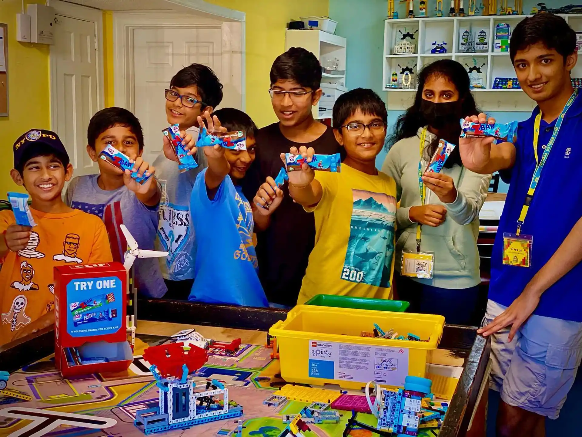 a group of kids posing for a photo