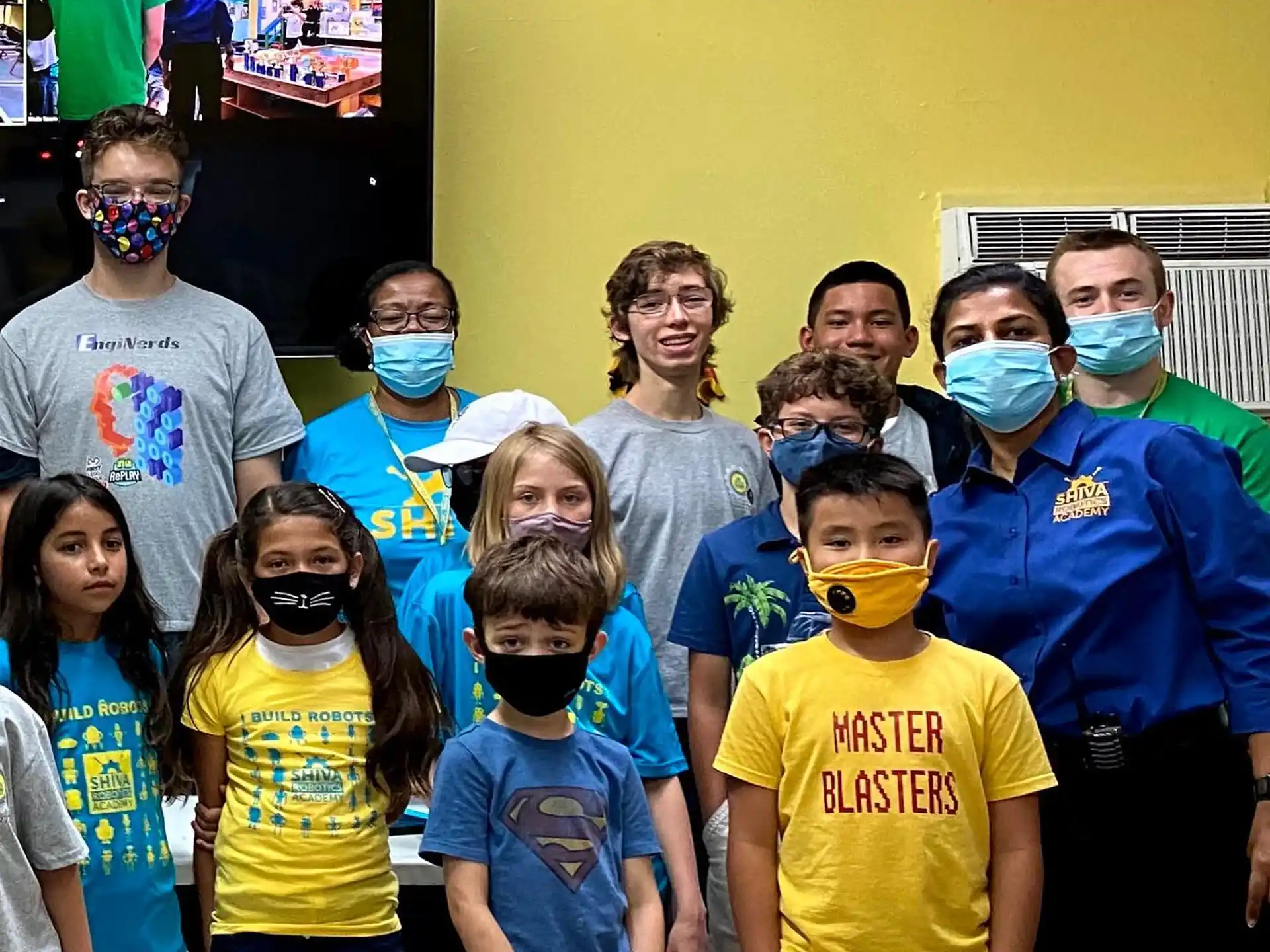 a group of people wearing masks