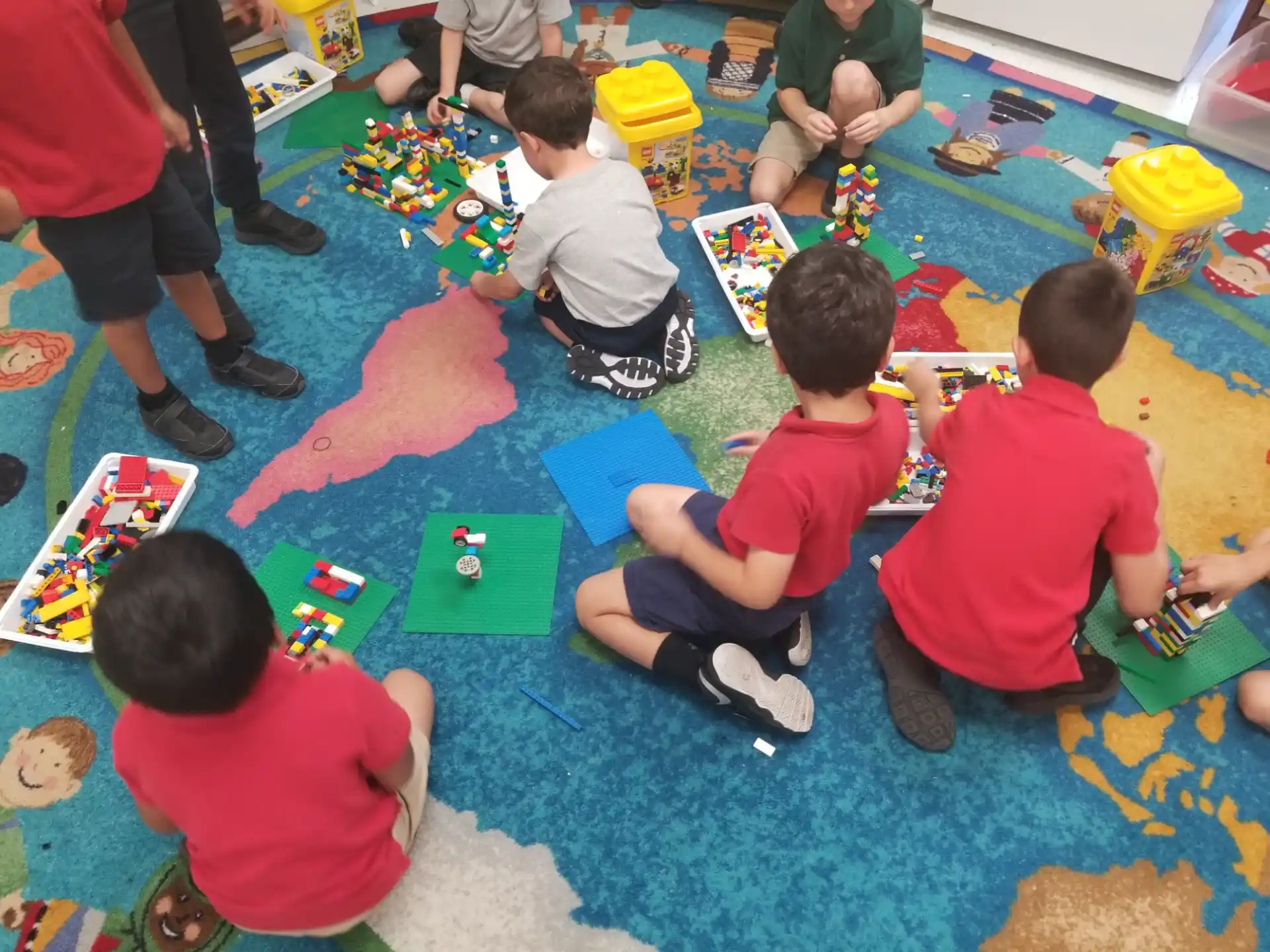 a group of children playing with toys