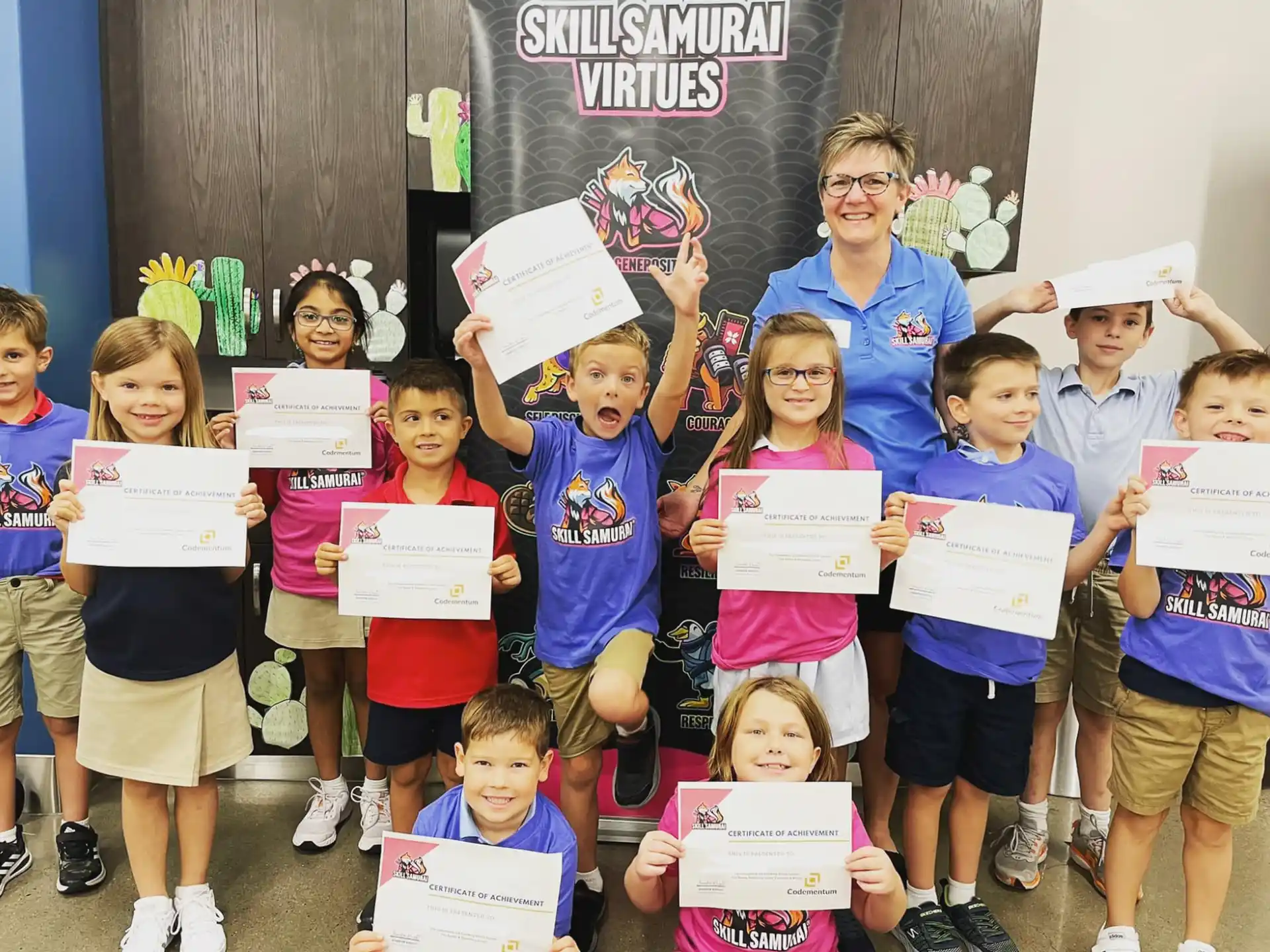 a group of children holding signs