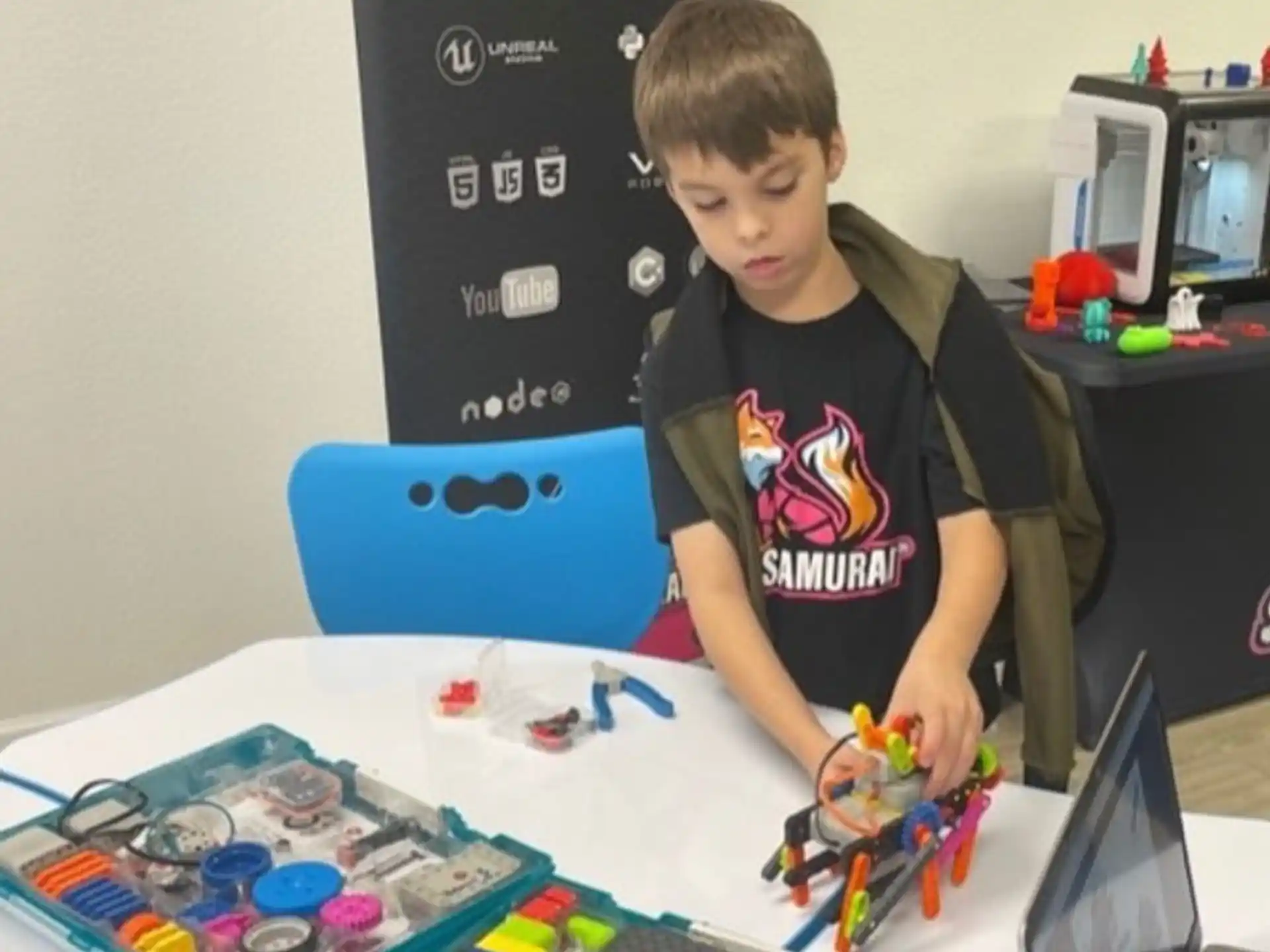 a boy playing with toys