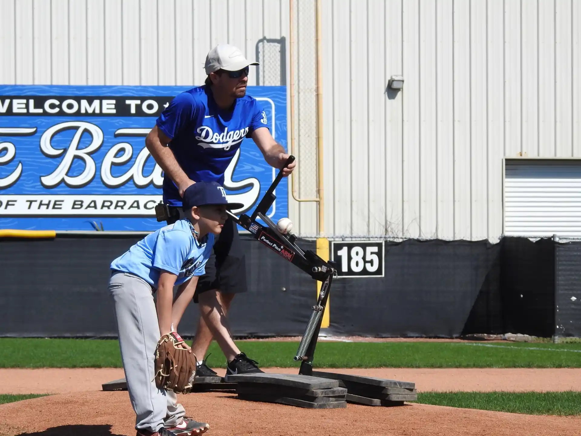 a baseball player prepares to swing a bat