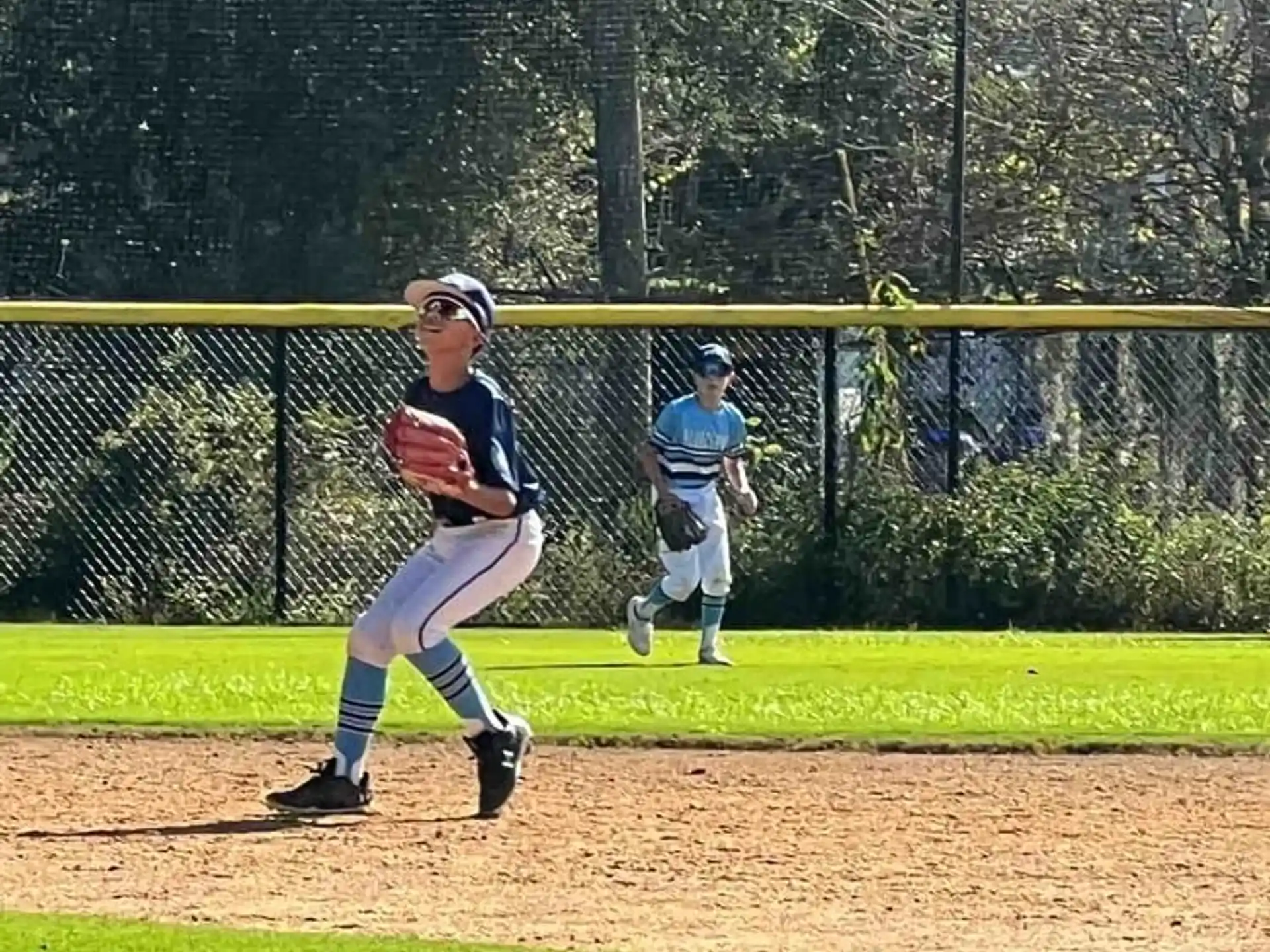 a baseball player running on a field
