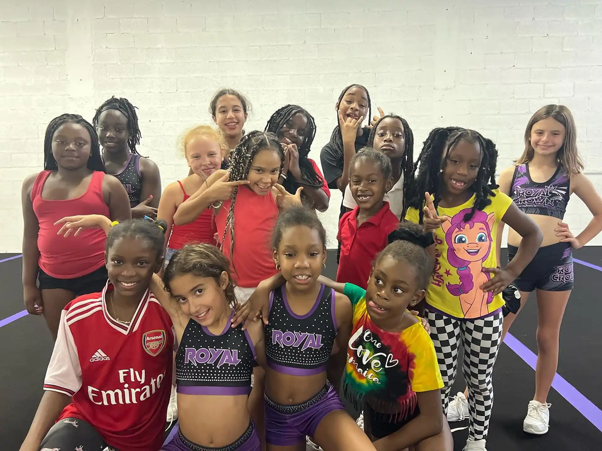 a group of girls posing for a photo