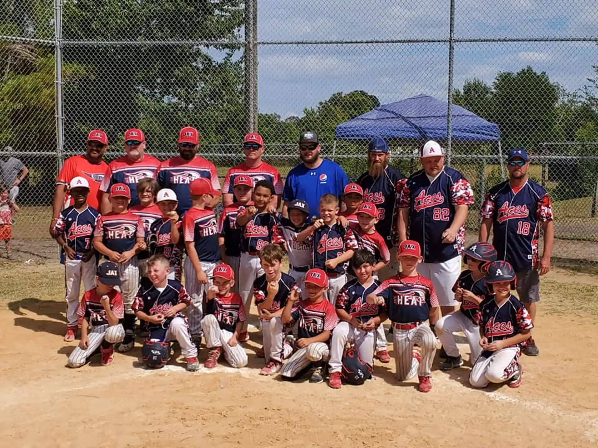 a group of baseball players posing for a photo