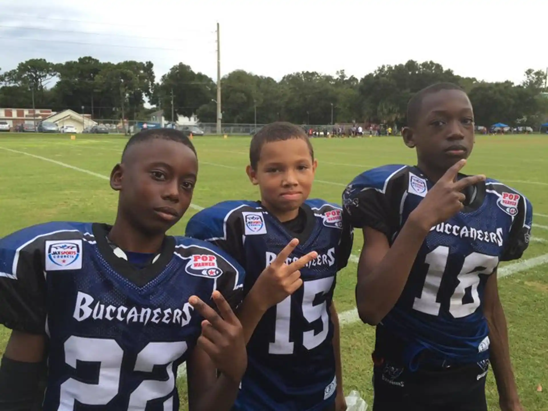 a group of boys in sports uniforms