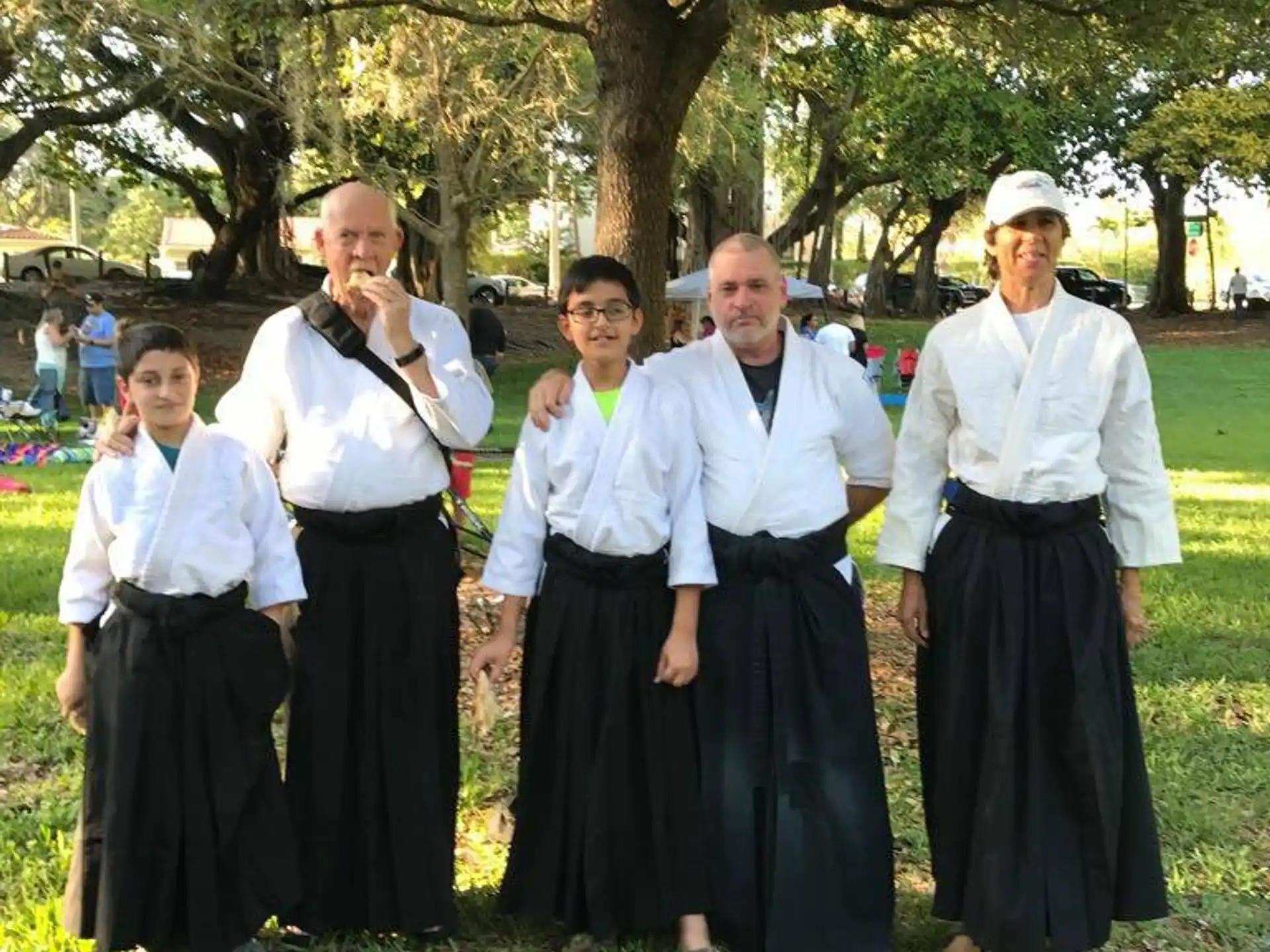 a group of people standing together outside