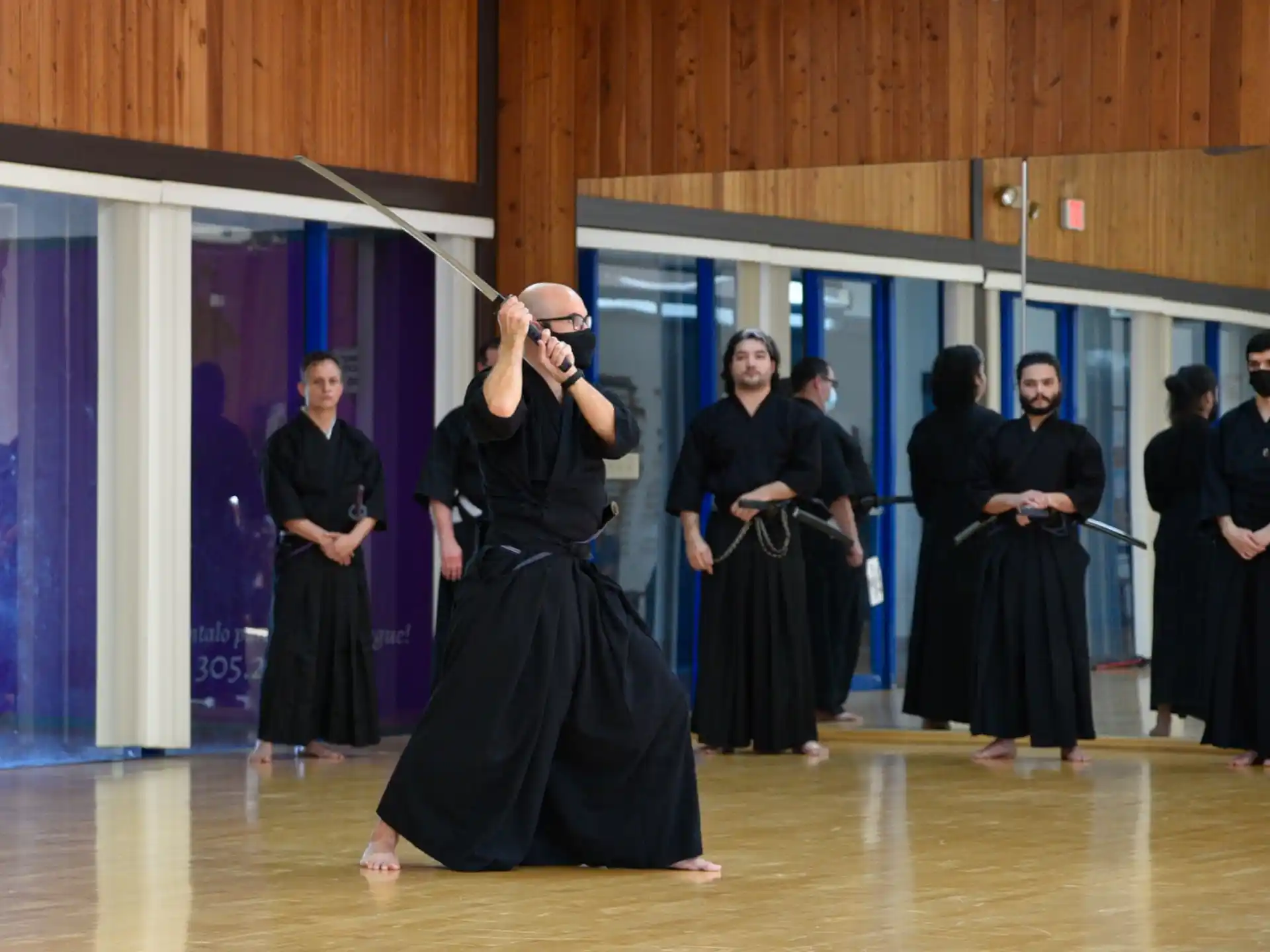 a group of people in black dresses