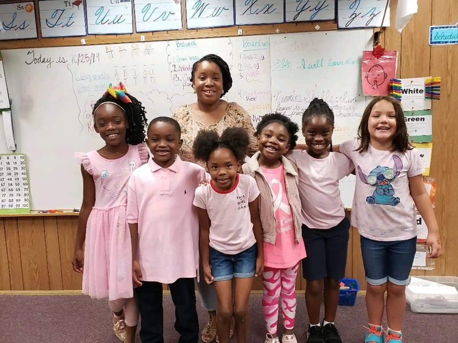 a group of children posing for a photo