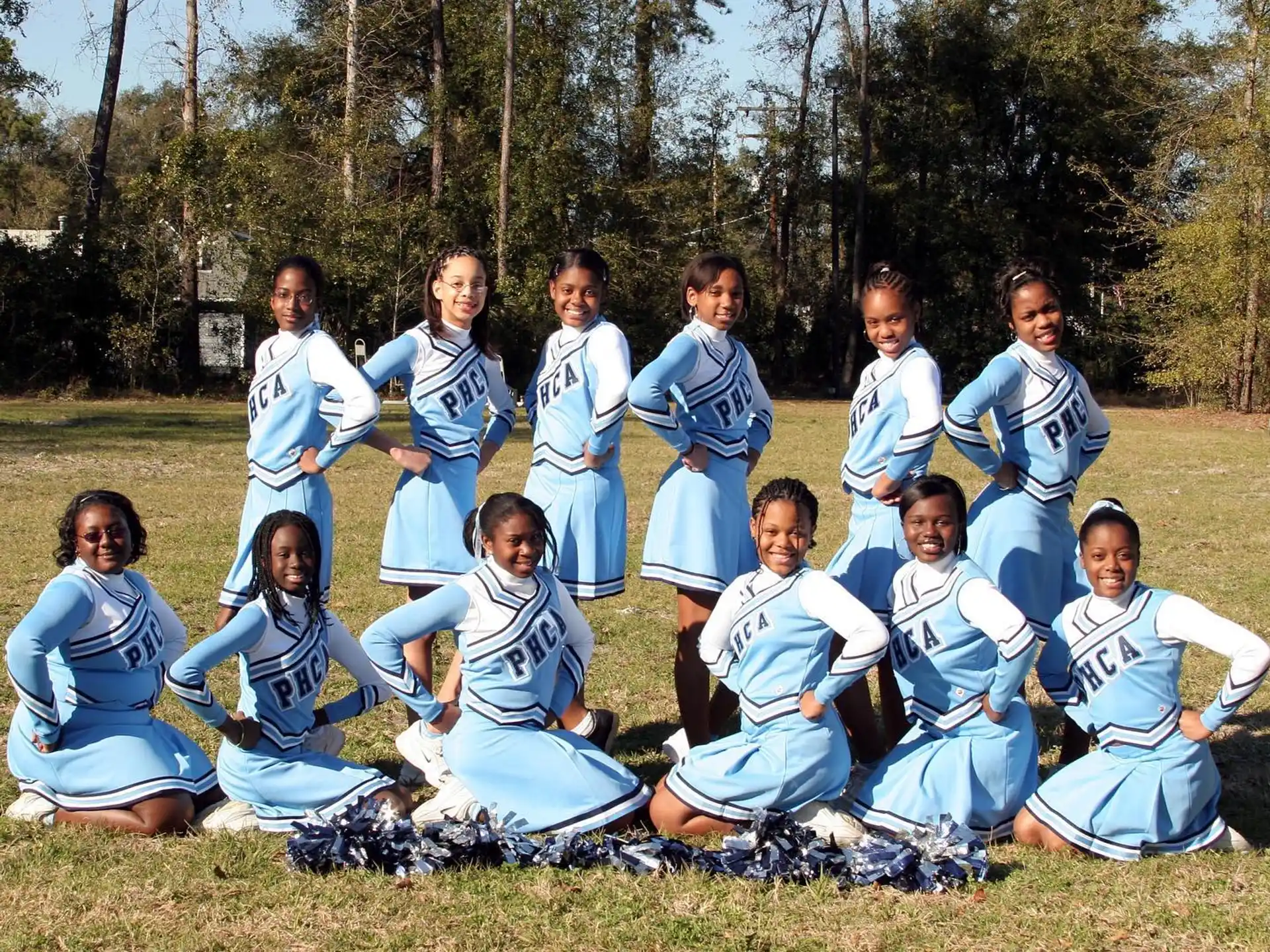 a group of people in sports uniforms