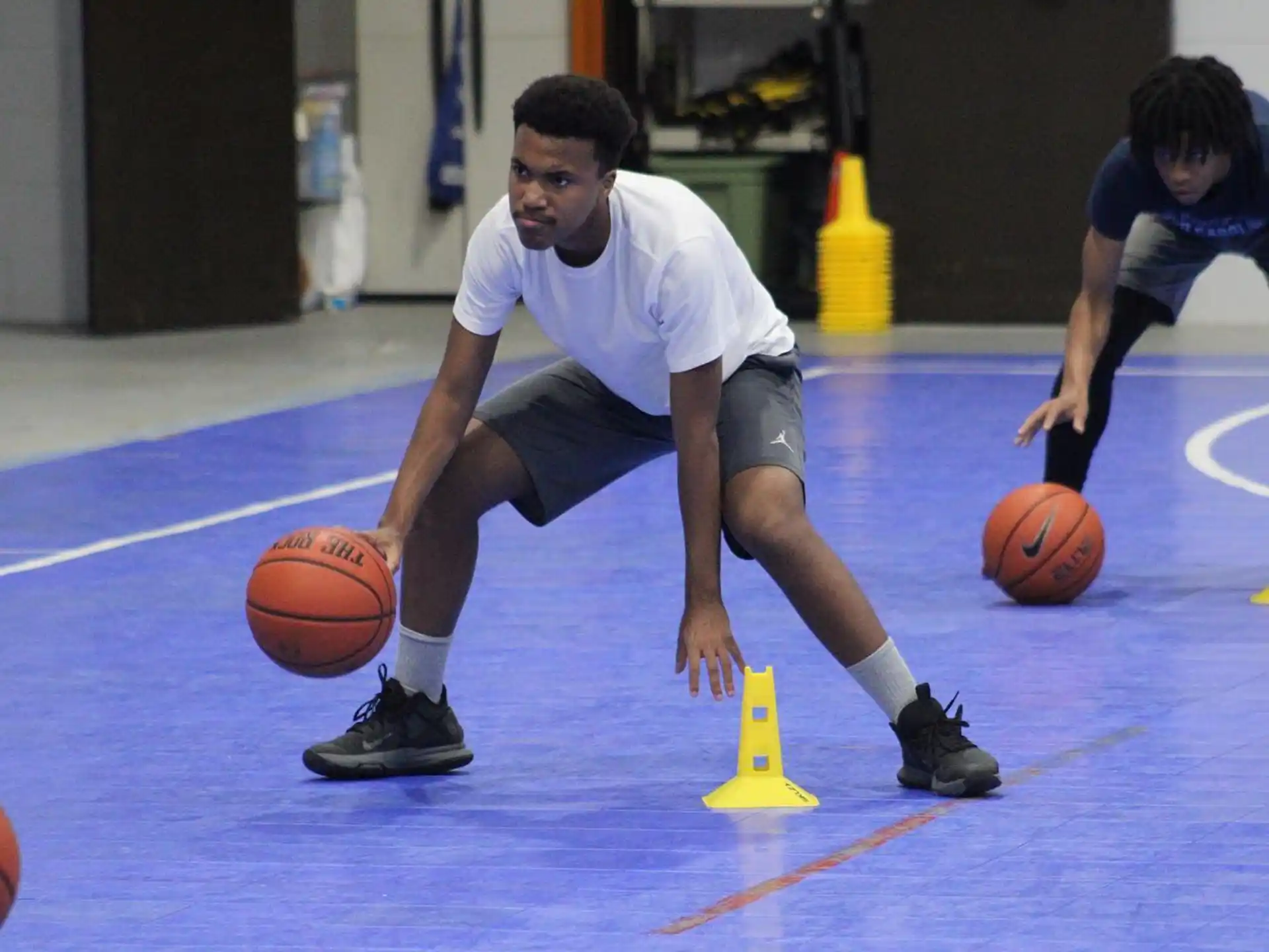 a few men playing basketball