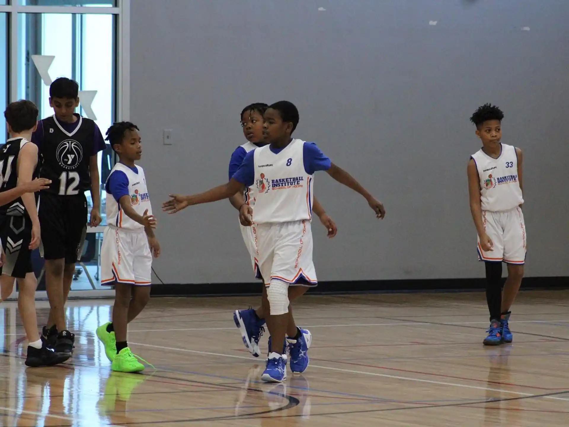 a group of boys in a gym