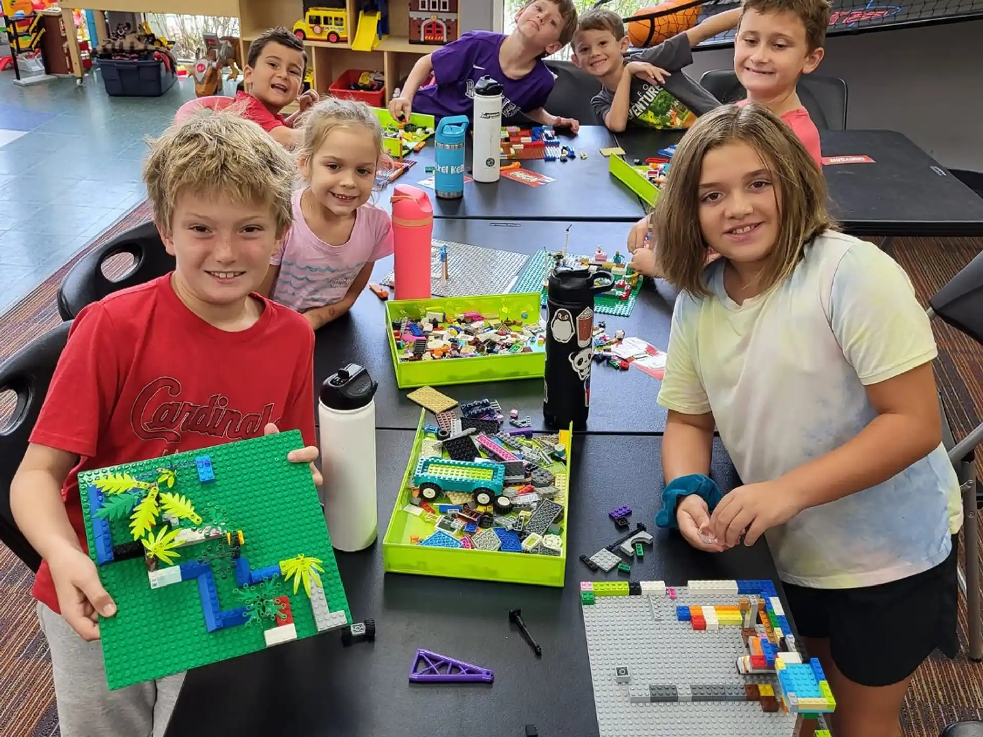 a group of children playing with toys