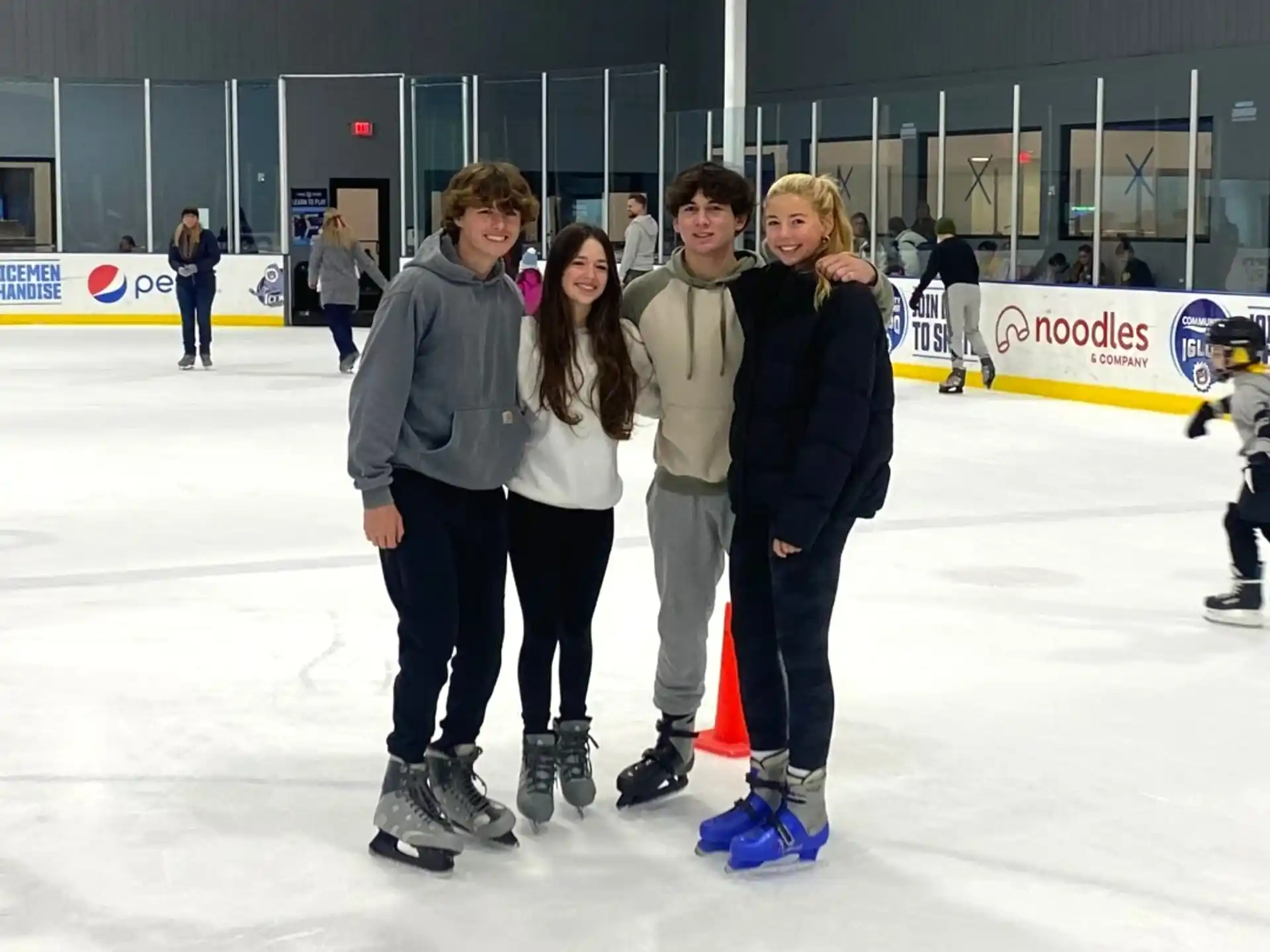 a group of people on an ice rink