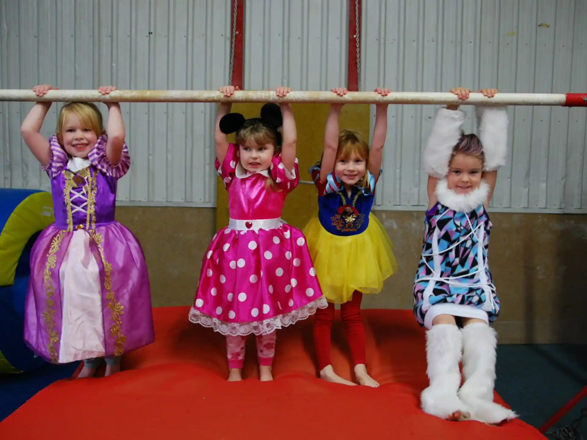 a group of children in clothing