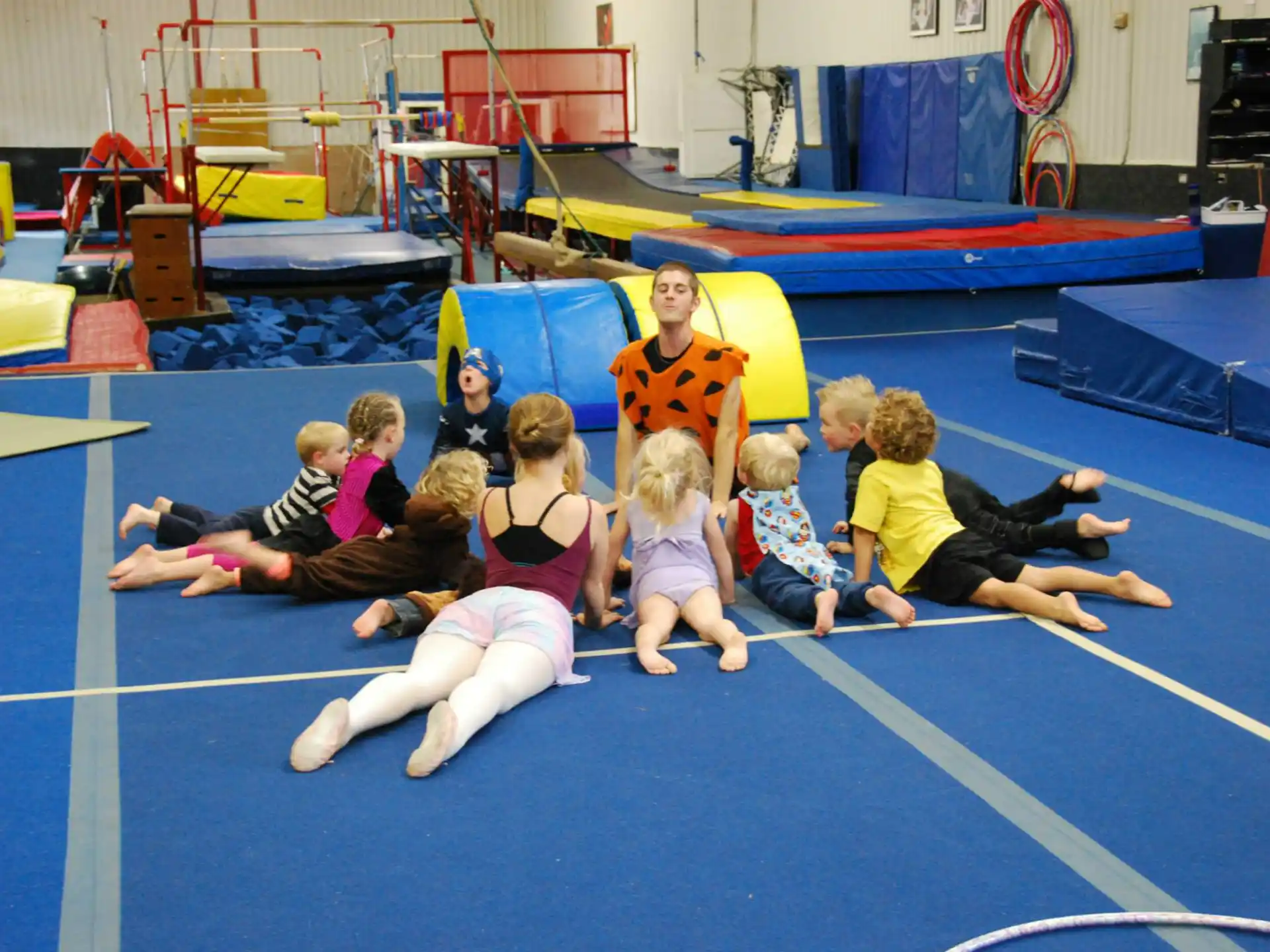 a group of people in a gym