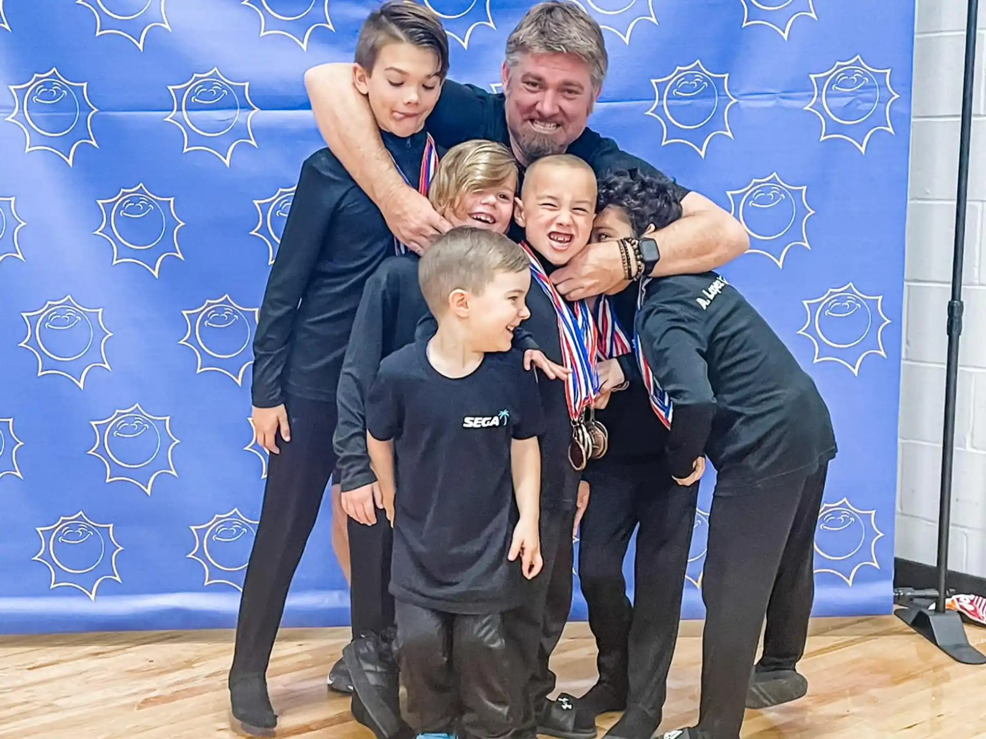 a group of people posing for the camera