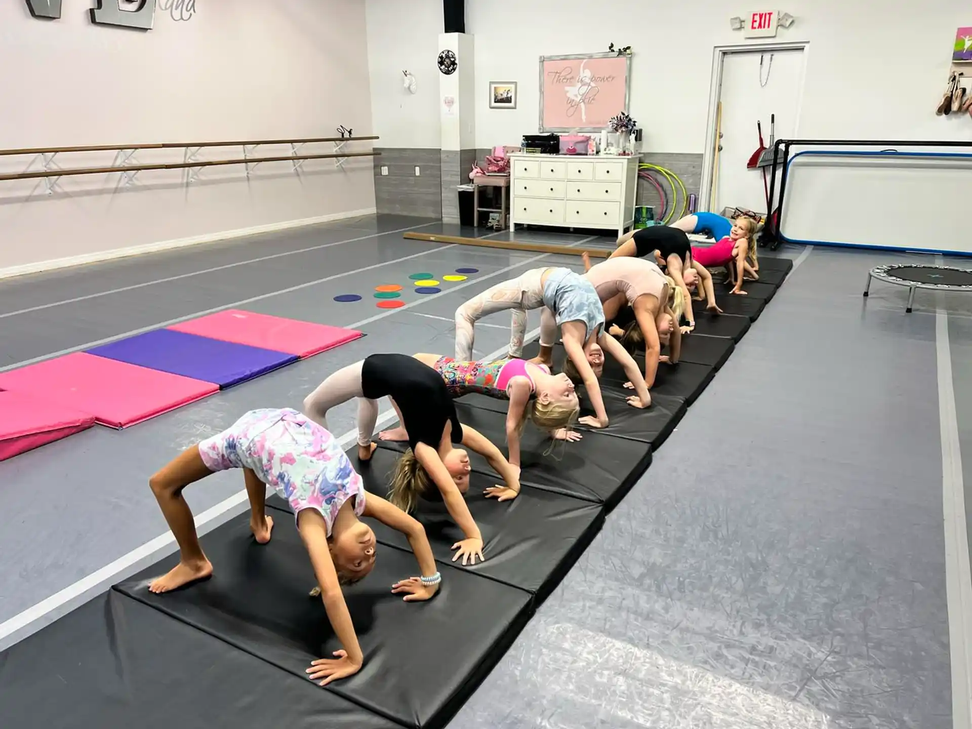 a group of people doing yoga
