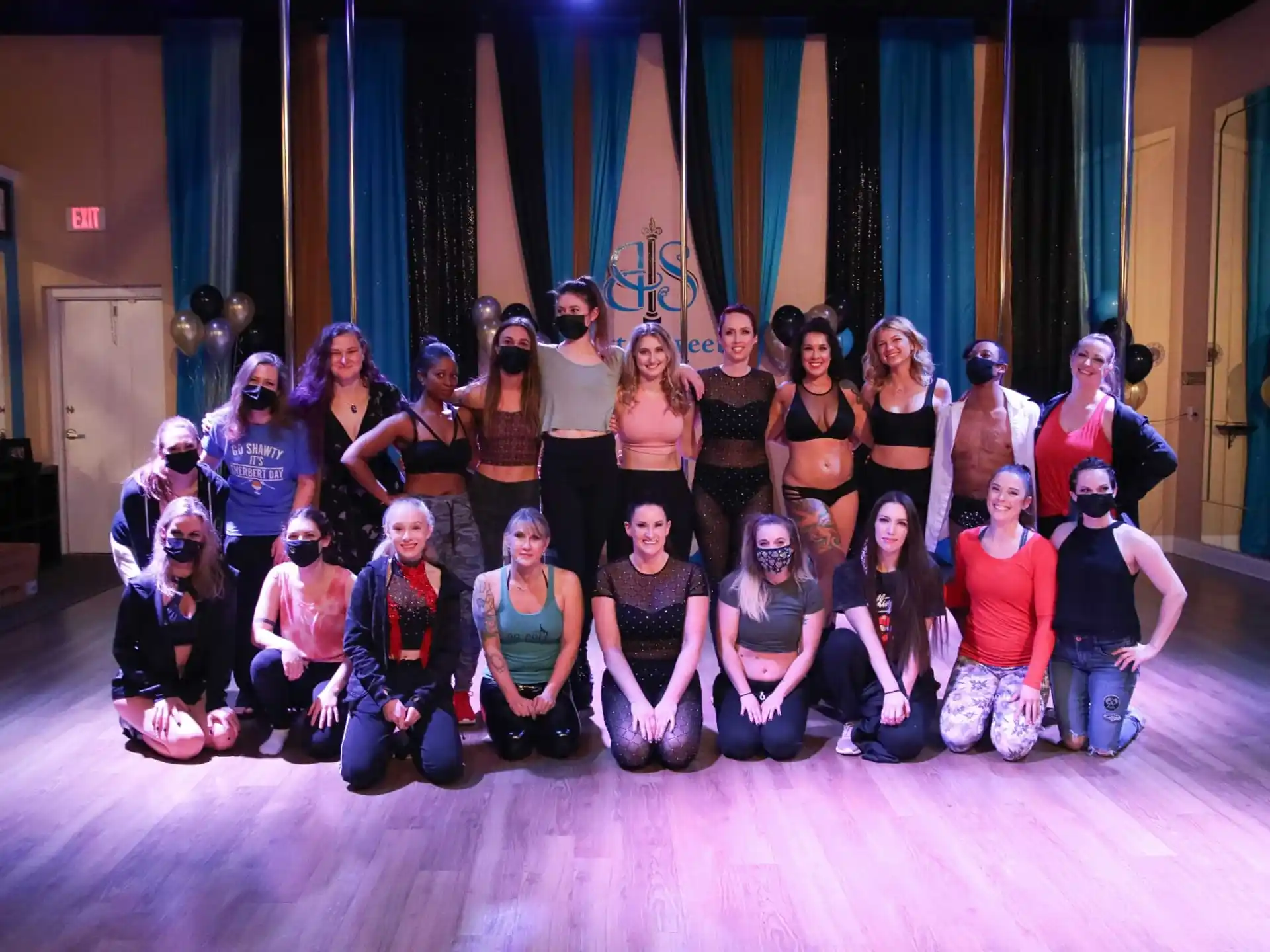 a group of people posing for a photo