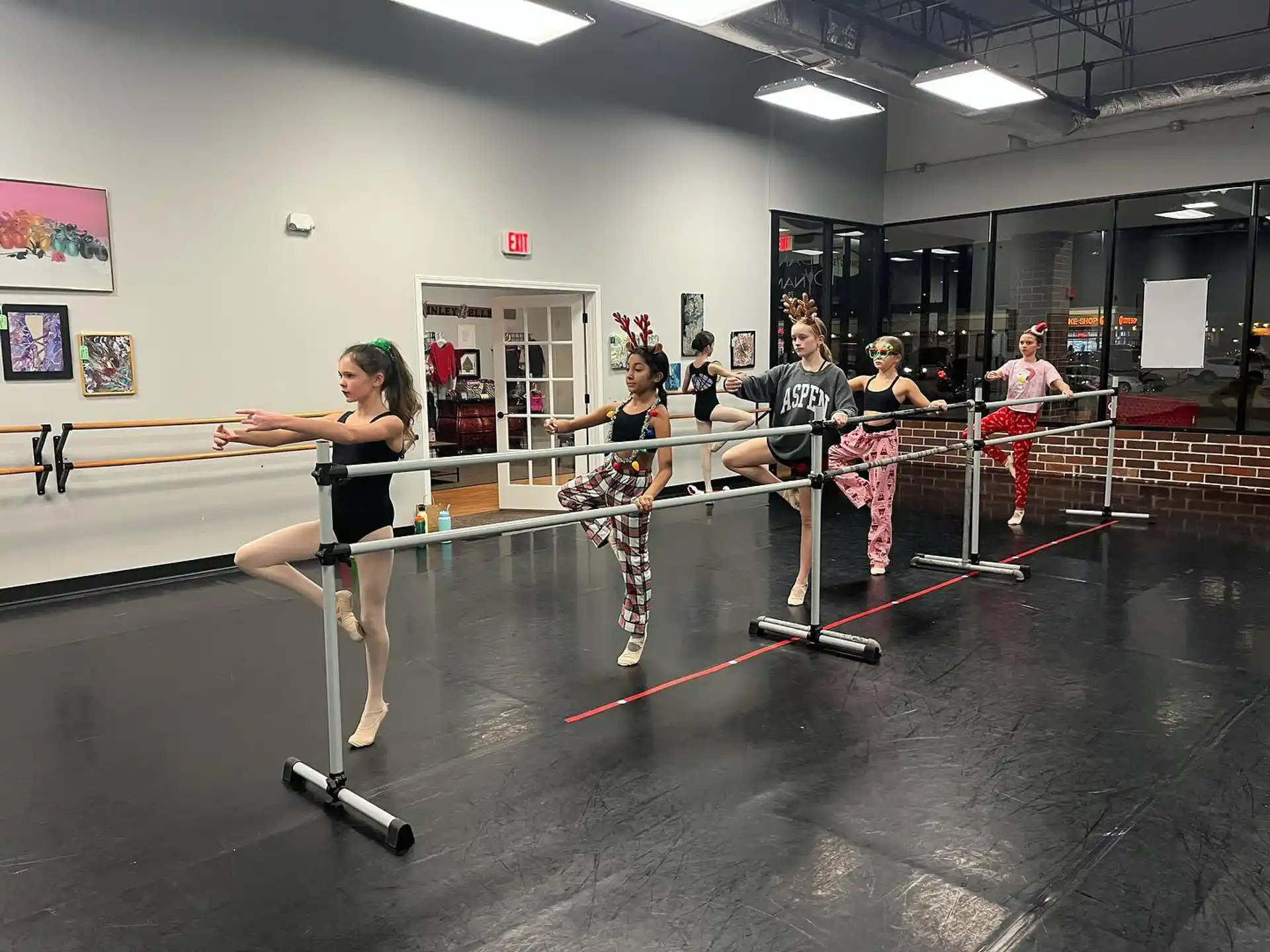 a group of people exercising in a gym