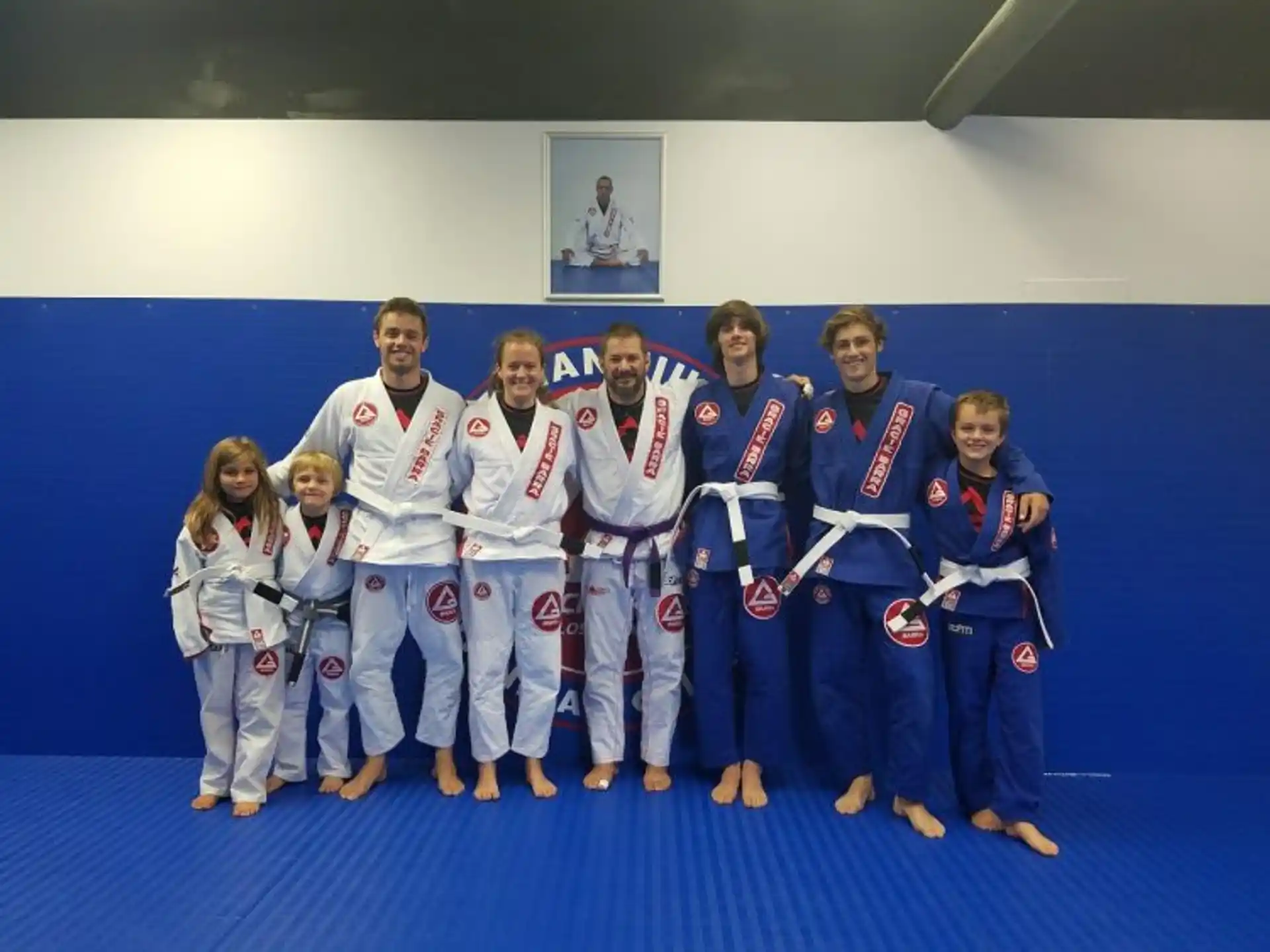 a group of people in karate uniforms