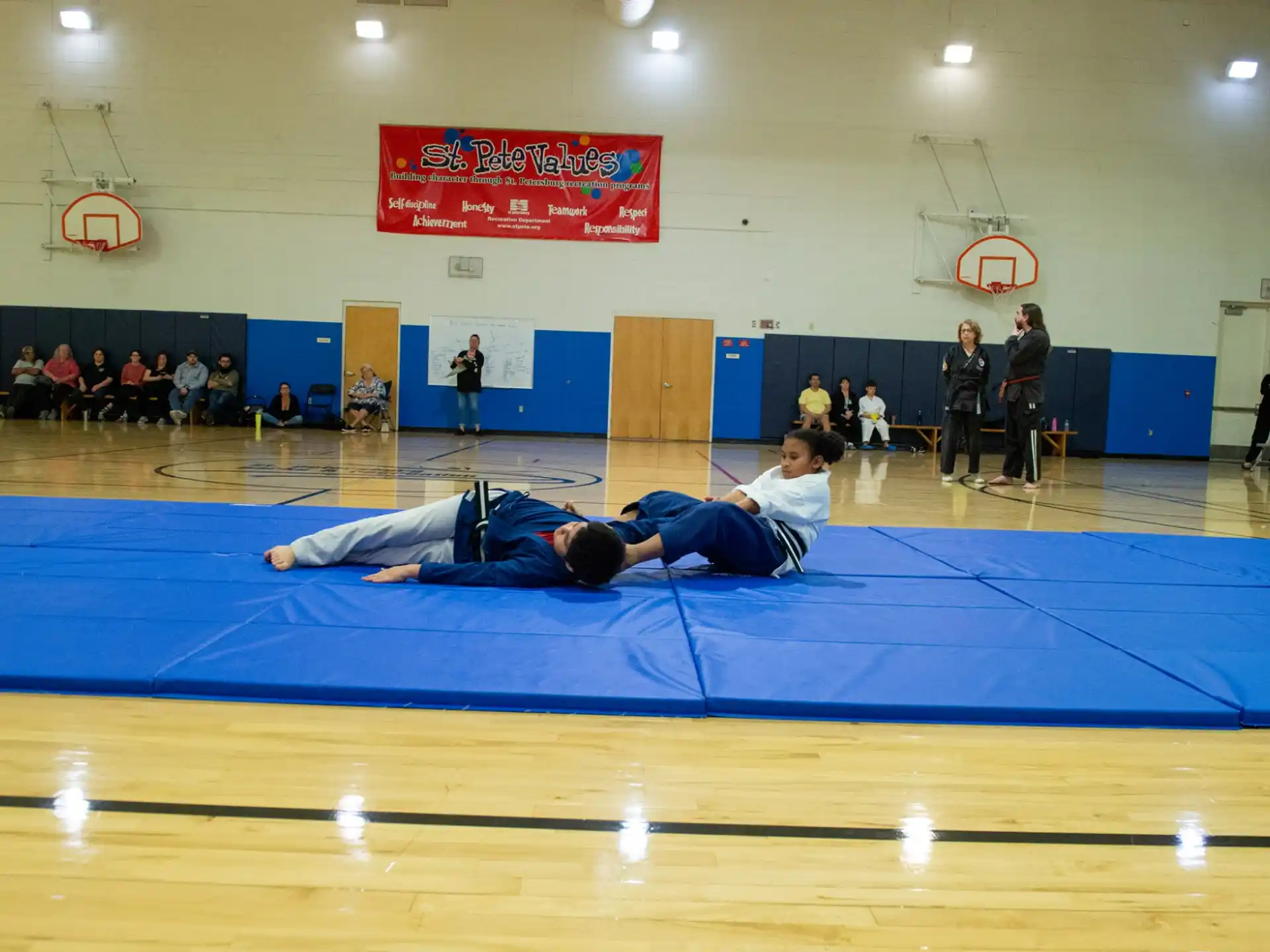 a group of people in a gym